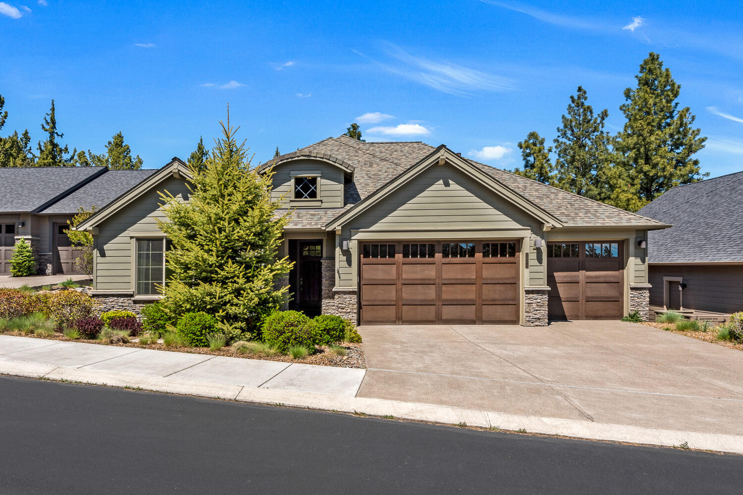 Beautiful 3-bedroom, 3 full bath, 3 car garage single-level home with views on River's Edge Golf Course. A 2,215 sq foot home which features large windows, vaulted ceilings, and an open floor plan that provides for a wealth of natural light. Master bedroom opens to a covered back patio where it feels like your own personal oasis. Stainless steel appliances, wood finishes, built in shelving and closet system, laundry/mud room with a built in bench, stone gas fireplace, and solid countertops. Embrace the Bend lifestyle while combining luxury living with easy access to amenities. A must see!