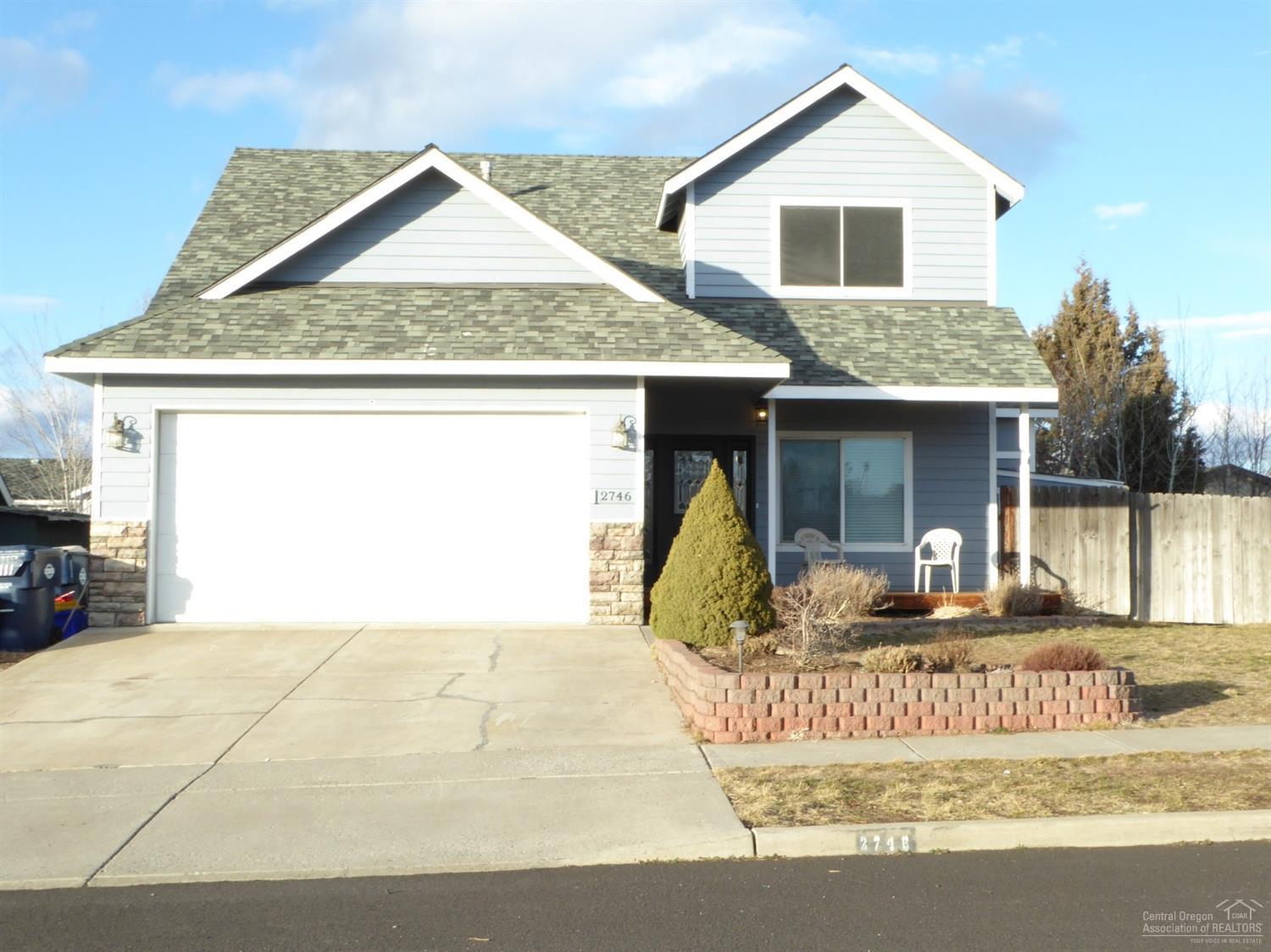 A true value in NE Bend's Eagles Nest neighborhood. Designed with family in mind, this 3 bdrm/3 bath home features a welcoming front porch, well- appointed kitchen w/stainless steel appliances, pantry, tile counters and dining area. Spacious great room w/office/den on main floor. All fresh and tidy with new laminate flooring, new carpet, new interior paint provides a dcor' touch. Vaulted master suite w/soaking tub in Ensuite. 1 Bedroom/den/office on main floor. Enjoy outdoor living & entertaining on your large back deck overlooking fenced backyard, storage shed w/garden beds ready for your green thumb. Wonderful location close to schools, shopping and medical.Nicely well-kept neighborhood with pride of ownership. This home is move-in ready, memories are made here, it is just a knock-knock away. You must see this home-you will be glad you did.<br>