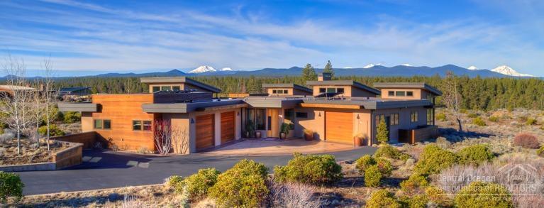 Rare opportunity to own this exquisite contemporary custom home with unobstructed Cascade Mountain views overlooking Shevlin Park, on one of the finest lots in Shevlin Commons. This single level home offers master separation, open floor plan, inner courtyard, guest wing, 3 car garage/shop and many ADA features making it ideal for aging in place. Other amenities include reclaimed Philippine mahogany floors, steam shower, two utility rooms, Solar electric & hot water and many other energy saving features.