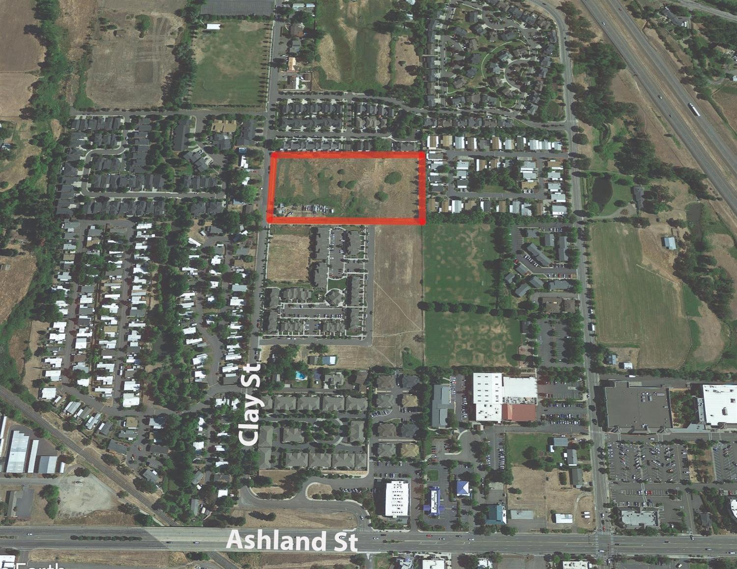 Rare Ashland residential land opportunity primed for development. The property is approximately 4.80 acres located within the Urban Growth Boundary for the City of Ashland, but is currently zoned county RR-5. Multiple zoning opportunities with annexing into the City. If the property were annexed under City of Ashland zoning R-1-3.5, for example possible subdivision of approximately 34 single family residential lots. The terminal points of Engle St are located on both sides of the property making it in the direct path of progress for residential development. Approximately 0.27 acres of wetlands have been identified and Seller to provide Buyer with documents during Buyer's due diligence.
