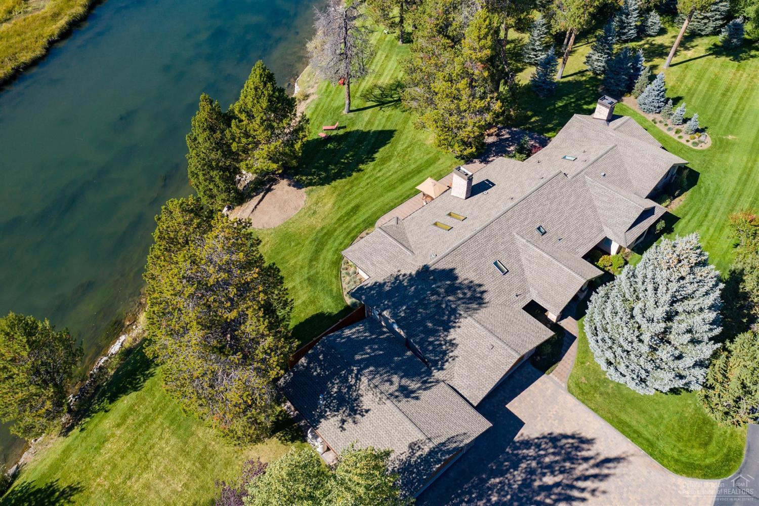 One-of-a-kind, secluded, single-level 3 bdrm/3 bath 3422 sqft home on 1.6+ acres w/snow-capped views of Mt Bachelor, Pistol & Bates buttes, w/ 260' riverfront views up & down Big Deschutes! In secluded, coveted, private community-- only 7 homes in over 30+ Blissful Acres development. With dock allowed & room to build desired tailored amenities for you! No HOAs. Grandfathered 50 ft setback w/protected marshlands across the River preserves your views! One look inside & outside the mature garden, & you'll know you're home!! Heated driveway & heated, epoxy garages (up to 7 cars and/or RV pkg). Great Rm floor plan, 2 masters incl 1 HUGE ensuite! Crown molding throughout. Granite countertops,Jenn Air Refrig, Dacor cooktop,oven & warming drawer. Tile,Radiant flooring, stacked rock fireplaces, Daiken & heat pump/AC, water purification, whole house humidifier & central alarm systems! Ebook: https://issuu.com/amerititle/docs/55655_gatehouse_ln_bend_hb. Se