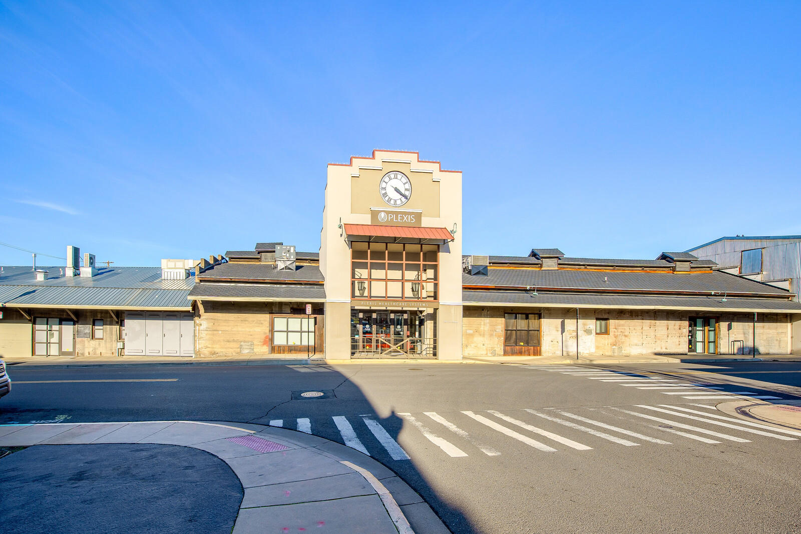Don't miss this incredible opportunity to own in a piece of Southern Oregon History. This commercial building not only provides 40+ offices, a restaurant style kitchen & coffee bar space, was formerly a primary train station in the heart of beautiful Ashland. Subtle touches of this property's rich history incl. interior railway cables & wrought iron accents paired w/ wooden beams, it's perfectly complemented by contemporary amenities such as high speed internet wifi connections & all the makings of a modern office setup. Larger open spaces to accommodate multiple office personnel/smaller break out spaces this unique commercial building. Ample parking spaces for both auto and bicycle. One room is even utilized as an employee yoga room to encourage a healthy workspace. This building is move-in ready for any large business or rent out spaces individually for a dynamic offering of commercial spaces. See it today.