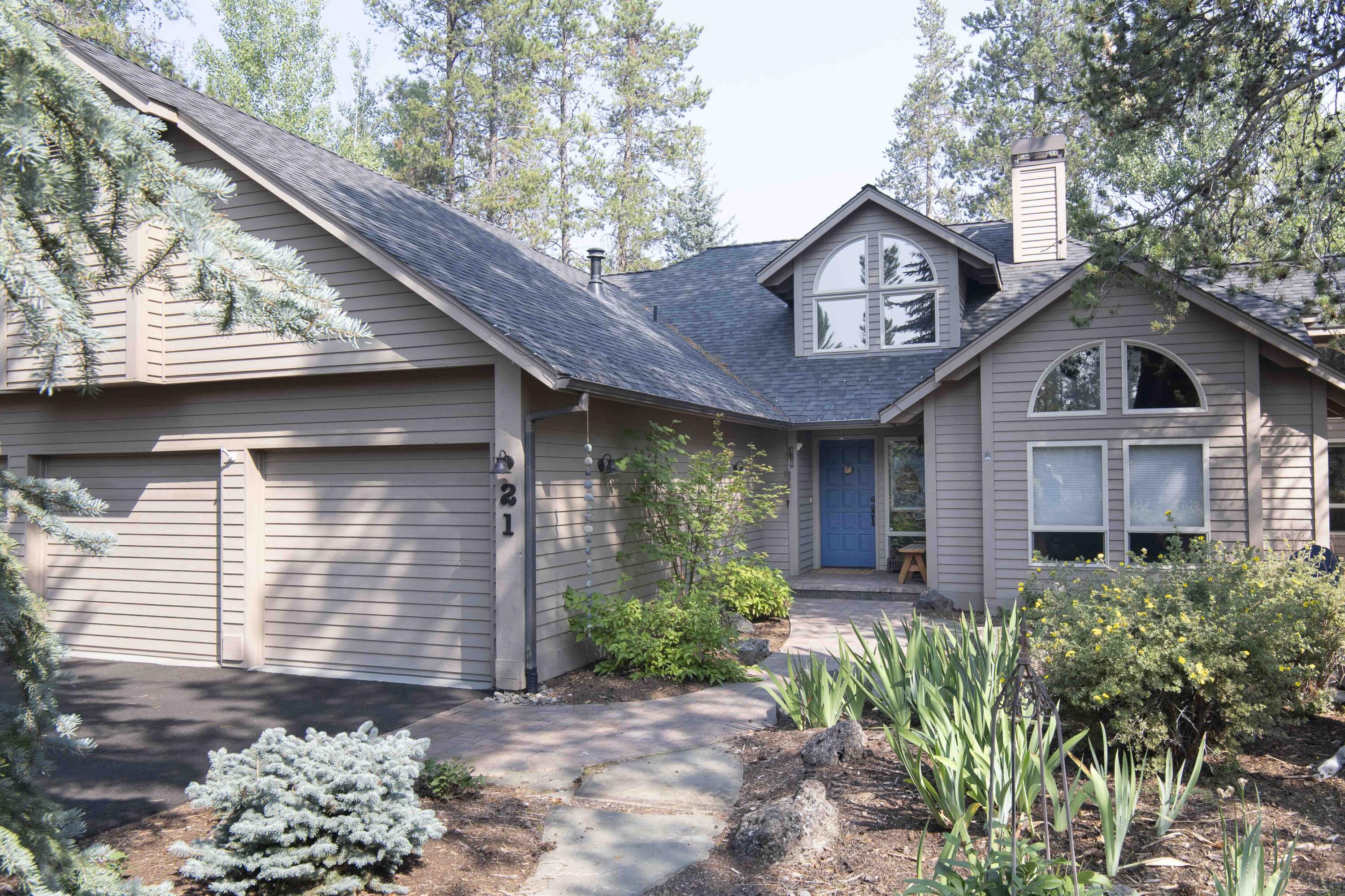 Escape to your own piece of paradise! This stunning home backs to the serene & picturesque Nat'l Forest where wildlife freely roam. For culinary enthusiasts, the kitchen is a dream come true w/ quartz counters, a spacious center island, SS appliances, a breakfast nook & breathtaking views! The main level boasts vaulted ceilings, creating an open & spacious ambiance. Enjoy cozy evenings by the gas FP w/ reclaimed brick surround, or head over to the great room, complete w/ a bar area & wood-burning Vermont Casting heat stove. With 4 bdrms, including 2 suites, this home offers plenty of space for guests. The main level primary suite features a modern bath w/ deck access & stunning landscaping views. The Trex deck is fully enclosed w/ a separate hot tub area. The lower level also boasts 2 guest bdrms & full bath, while upstairs offers a 4th suite & bonus area. Add'l features are 2.5car heated car garage, shed, central vac, new asphalt drive 2022, paver entry & new front landscape.