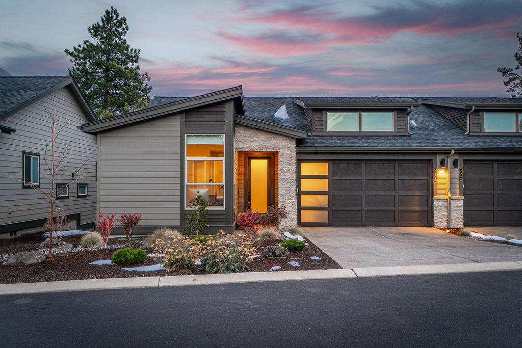 Listing expires 1/31 so if you are searching for affordable Luxury River Front Property within the city of Bend, now is your time! River front, like new & move-in ready. Stunning and private townhome with hard to find direct river frontage and access! Paddle board and kayak just steps from your backyard - listen to the river and enjoy all the amenities of this beautiful gated community! Lightly lived in open floor plan with enormous covered back deck perfect for entertaining and relaxing all year round. Great room features a gourmet kitchen, gas fireplace, kitchen island, entertainer's bar, built-ins and sliding doors out to deck creating a seamless indoor/outdoor flow. Separate, gorgeous & private XL Primary suite with door out to deck. Large front den/BR off of entry, guest bedroom and bath down the hall. High ceilings, new carpet, hardwoods, modern finishes, fenced yard & extended garage. Don't miss: HUGE crawl space could easily be finished out!