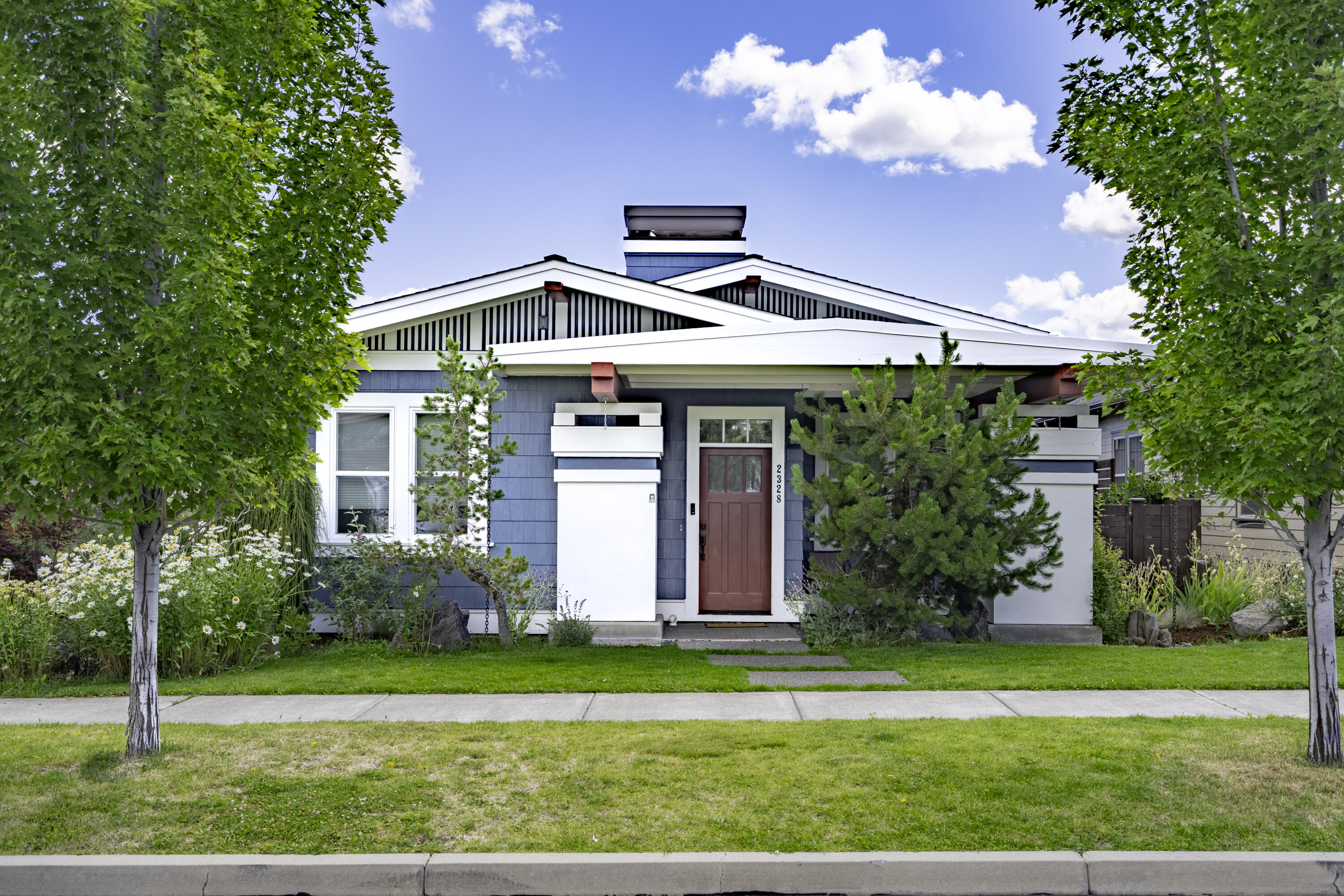 Located in the popular Northwest Crossing neighborhood on a low traffic cul-de-sac you will find this single level, energy efficient, 3 bedroom, 2 bath 1495 sq ft Bungalow Style home. The covered front entry porch welcomes your guests and offers a sanctuary from the weather. Enjoy the open floor plan with quality finishes and vaulted ceilings. There is hard surface tile and engineered hardwood flooring throughout and natural light brightens the living rooms. The south side yard is fully fenced for pets, and the patio offers a stone water feature and natural gas firepit ideal for outdoor entertaining. The attached double garage has a dog washing station, built-in storage cabinets and a fully fenced north side service yard with alley access. The immediate neighborhood has great curb appeal and is conveniently close to parks, schools and shopping. Start your next adventure here!