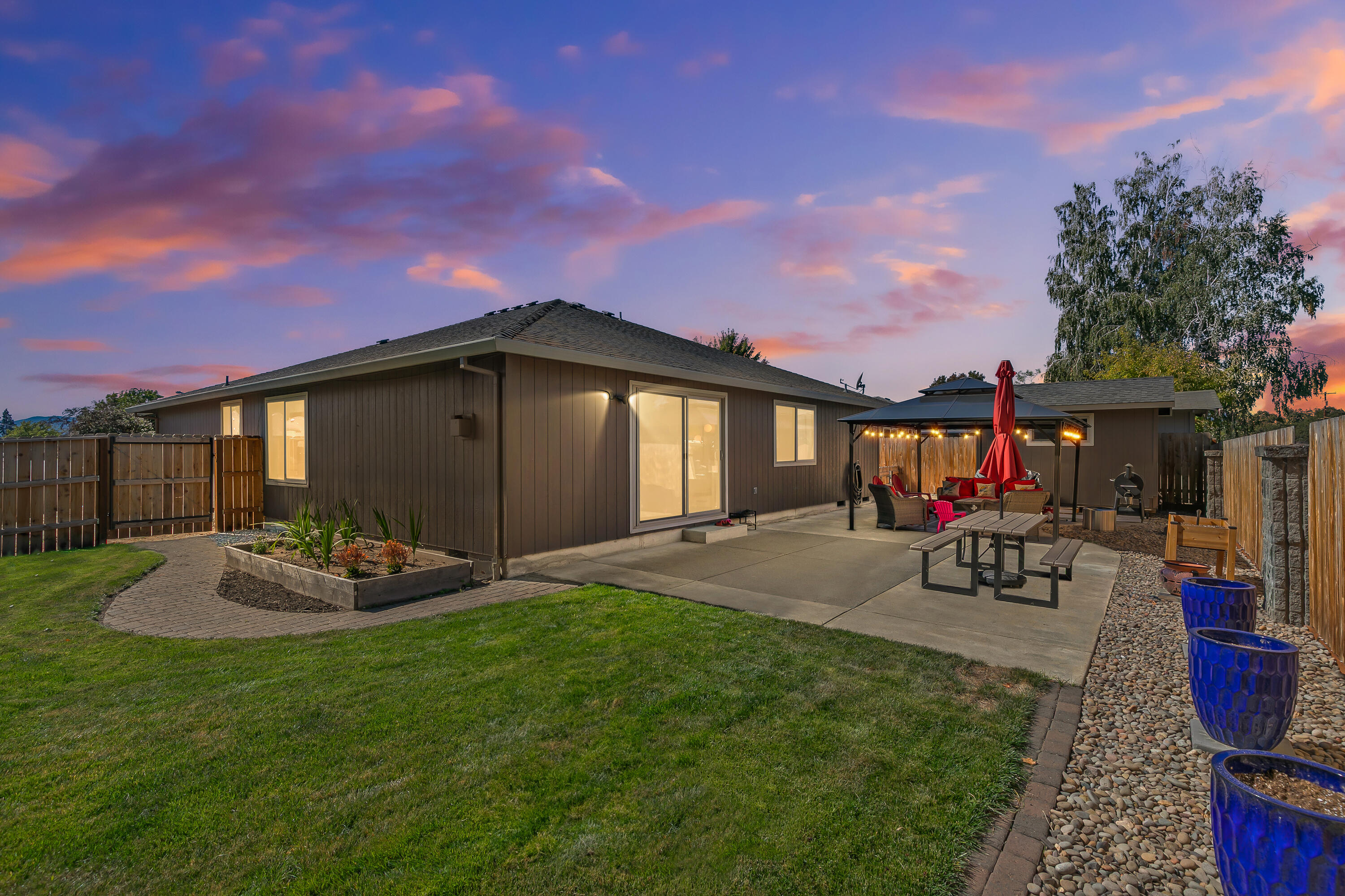 Pride of ownership shines in this well-maintained 4-bed, 2-bath home in a quiet Central Point
neighborhood. With 1,665 sq ft on a 0.17-acre lot. It features recent upgrades including a AC
system, updated water heater, stylish flooring, quartz kitchen counters, refreshed landscaping,
and upgraded fencing. Enjoy RV parking with a newer driveway, a gazebo for outdoor
entertaining, and a shed with electricity for added storage or workspace. All appliances stay,
including washer, dryer, and refrigerator. Whether you're hosting guests or enjoying a quiet night
in, this home checks every box. Don't miss your chance to own this beautiful home. Schedule your private tour today!