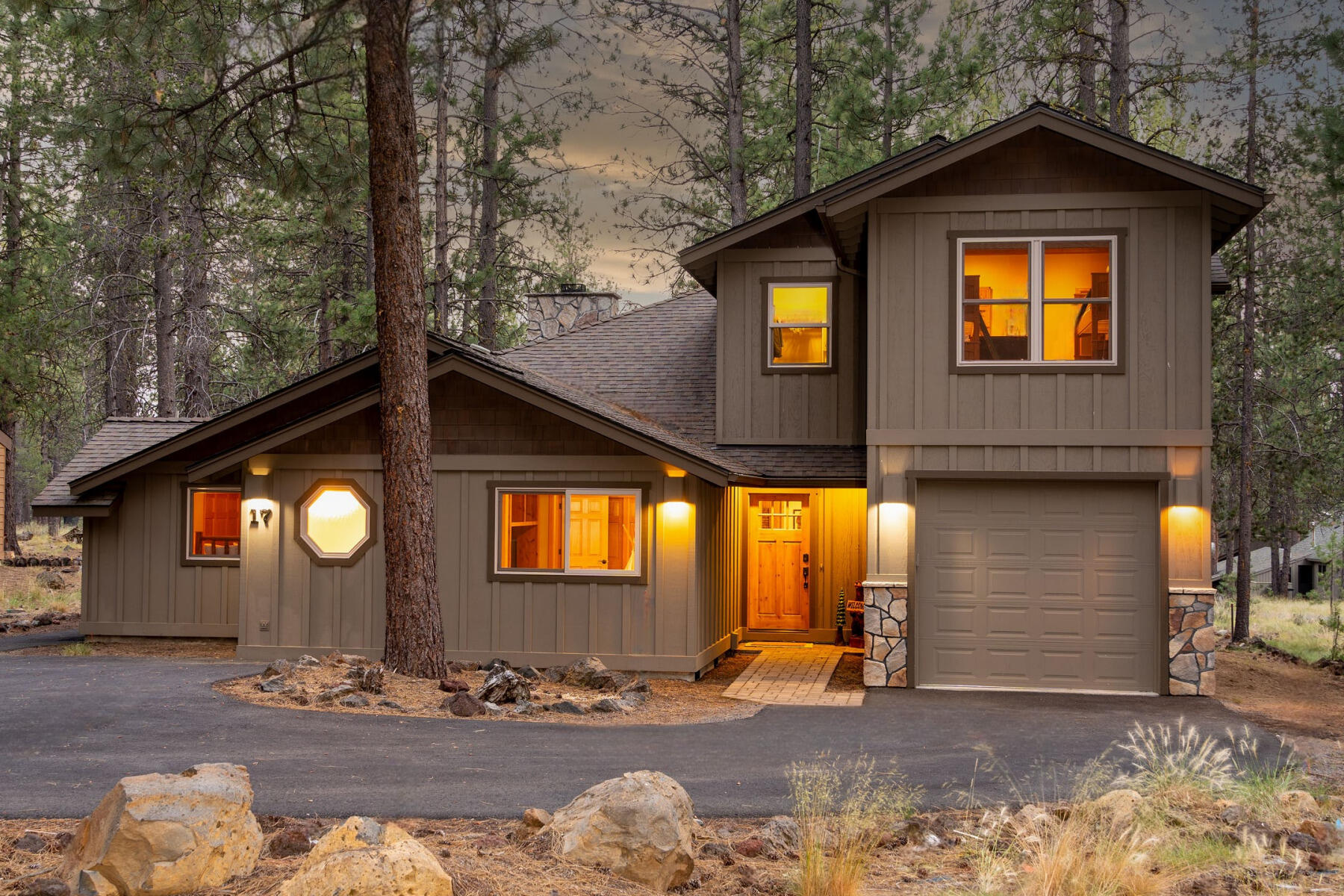 Base camp for adventure! Impeccably maintained 2,258 sq. ft. 4-bedroom, 3-bathroom home on a .12-acre lot. Excellent location for all your Sunriver activities with easy access to the bike path, SHARC, the Village, and Fort Rock Park. Abundant natural light, vaulted tongue and groove ceilings, hardwood floors, wood paneled walls, and floor-to-ceiling wood burning fireplace add mountain charm. Living space flows into the open concept kitchen and dining area keeping everyone connected and enjoying time together. Spacious primary suite with bonus room offers many possibilities. An additional bedroom with laundry area and second full bath completes the main level. Upstairs you will find a large bunk room with a walk-in closet and second laundry area, as well as a full bath, and a 4th bedroom/media room with generous walk-in storage room. Enjoy nature from the back deck overlooking forested common area and the bike path. Attached one car garage. This turn-key home is ready to make memories!