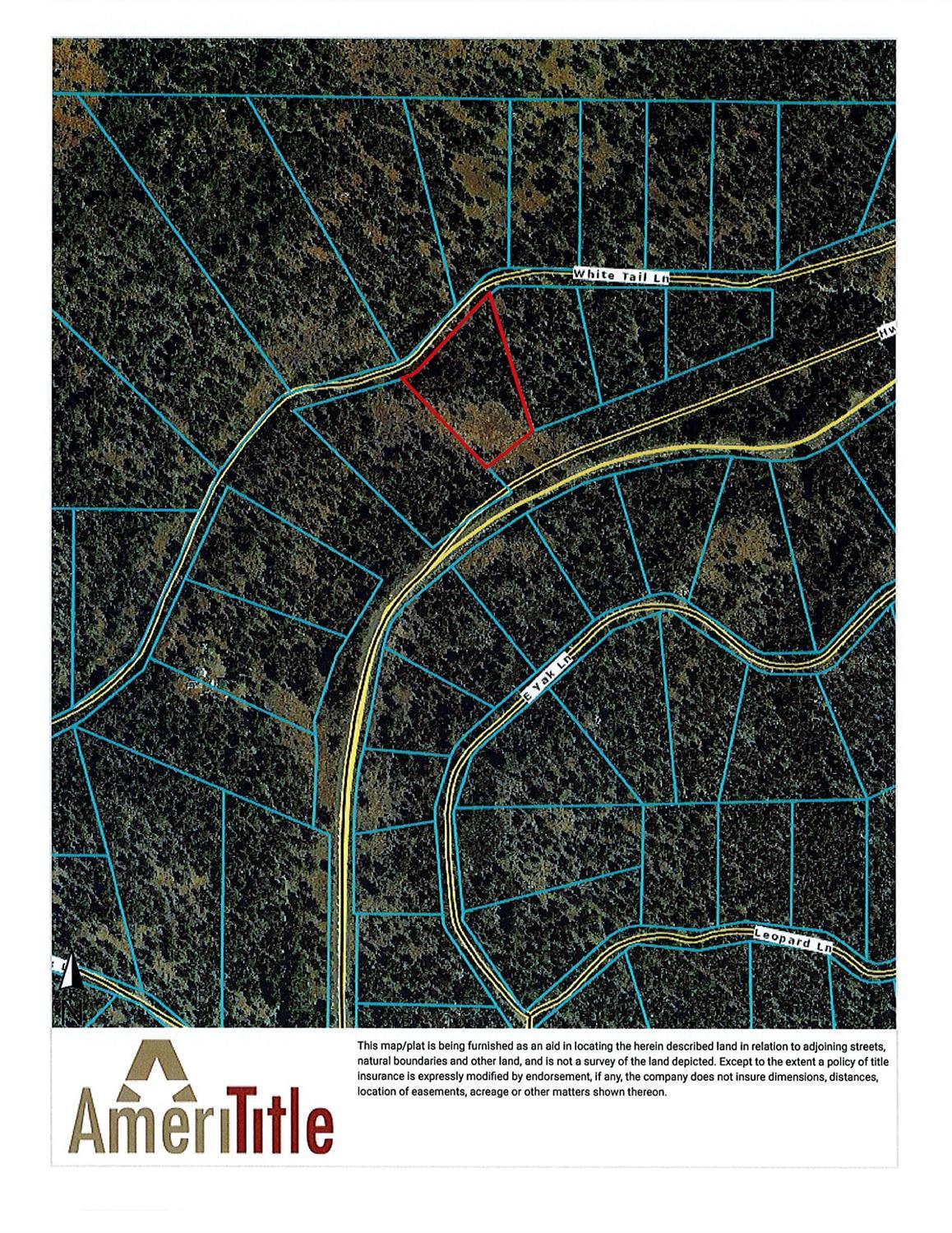 Wooded area lot 2.54 acres in Klamath Falls Forest Estates. Backs to Highway 140 and close to paved road, power and National Forest.