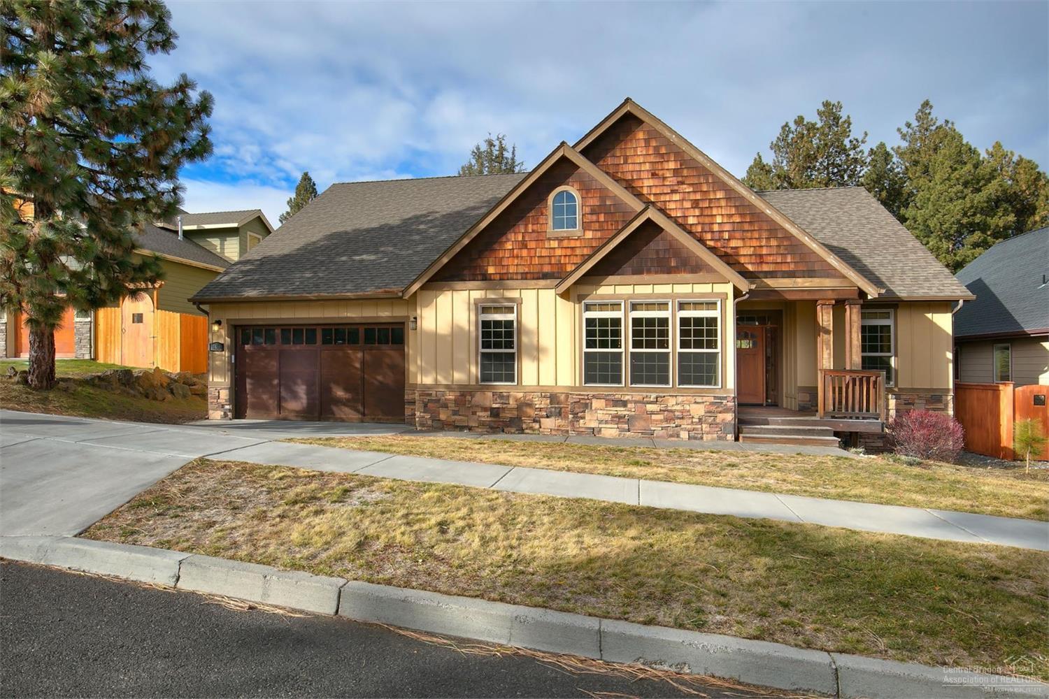 Beautiful Craftsman home in lovely Blue Ridge neighborhood. This single level 2001 sq ft home boasts new interior paint, wood flooring, open great room floor plan w/vaulted ceilings, granite counter-tops, stainless steel appliances, wood wrapped windows, blinds and doors. Large master suite and master bath with soaking tub. Fenced back yard with covered back deck. Exterior of home to be painted and decks to be stained when weather permits (paid by seller). Put this one on your list of must sees!