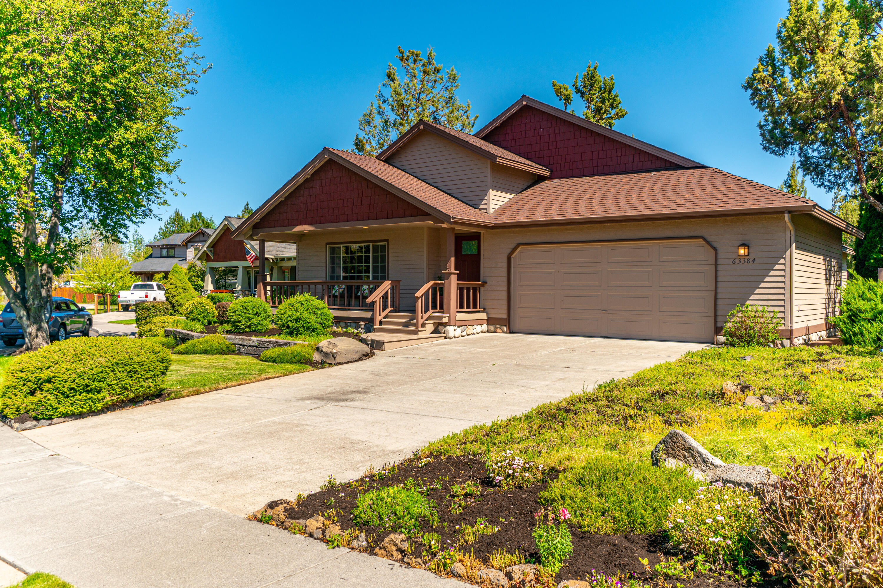 This single level NE Bend home has been meticulously cared for and is ready for you. Located on a cul de sac this home features a gas fireplace in the living room, an open kitchen with great room feel, vaulted ceilings, hardwood flooring through entry with well cared for carpet throughout, coffered ceiling in main bedroom, walk in closet and so much more Views of the canal from the main living area and main bedroom. Enjoy the summer nights with a fully landscaped backyard, large deck, and a hot tub location already established. Move in ready and waiting for you! Schedule a showing today.