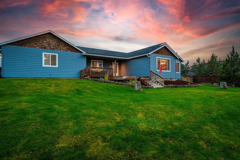 If there was a model home for ''Pride of Ownership'' this would be it. This beautifully and completely upgraded property features a spacious living room with beautiful mountain views, and large additional living area as well as a master bathroom full of luxury finishes. Peace and tranquility are an under statement in the early evenings on the front porch overlooking the fully landscaped property, water feature and Cascade views. The backyard is completely landscaped with a spot designated for an above ground pool and hot tub. Large steel building with 2 garage doors, one extended for RV. Truly a must experience property.