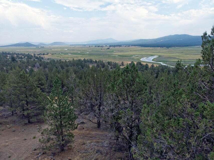 Owner Carry Terms Available!! Looking for an inexpensive lot close to everything Sprague River has to offer! If so, this is the one for you! Close to the river, this 2+ acre lot features a graveled driveway, privacy, and useable land. Trees throughout the property provides firewood and the perfect nature setting. Seller is willing to trade this parcel for a vehicle of equal value. Tough to find lots with so much to offer at such a affordable price so contact your agent today for a personal tour, before it's too late!