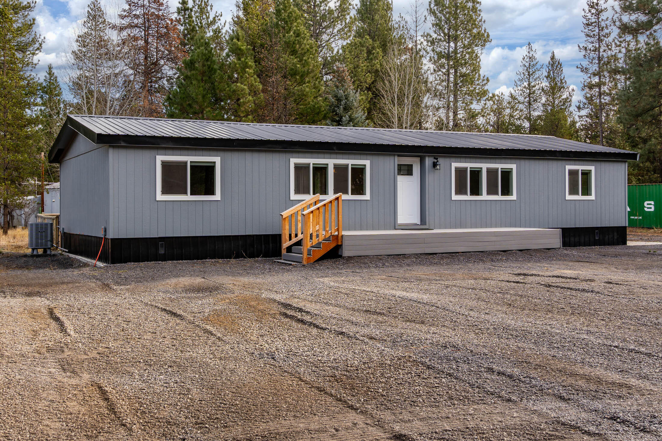Completely Reimagined La Pine home blending durability with modern tech. 51488 Hann Rd features a new slab foundation with 11'' insulation, new metal roof, siding, and windows. Inside, find tongue & groove ceilings and a stylish kitchen with acid-stained concrete counters, farm sink, and smart LED lighting. The living room includes installed surround sound. Bathrooms are fully overhauled with new showers, heated mirrors, and Bluetooth fans. Major systems are worry-free: new PEX plumbing, insulation and drywall throughout, new flooring, hot water heater, furnace, well pump, and compliant Orenco AX20 RT ATT septic. The fenced backyard is adventure-ready with full RV hookups (insulated water, 30-amp power, septic) and hot tub prep. Includes a dedicated 30-amp bedroom outlet (used for tanning bed). This is the ultimate low-maintenance basecamp. Schedule your private tour today!