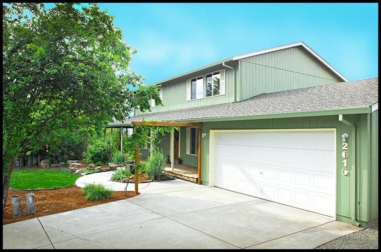 Located on a large .36 acre lot, this spacious, clean & comfortable house is perfect. This house offers 4 bedrooms, 3.5 bathrooms & Energy Star efficiency. Close to conveniences such as shopping, coffee shops, hospitals, banks, Roxy Anne Vineyard & Cedar Links public park! Enjoy the beautiful green view of the front yard from the living room and dining area . The kitchen has an abundance of cabinet storage and comes with a large stainless steel refrigerator! All four bedrooms are quite roomy with TWO master bedrooms, with large walk-in closets. The largest room could be a playroom, bonus rm, bedrm, art studio, home theatre... Includes a mud/laundry rm & 3 storage closets. Finished garage has large work bench/ample storage. Back yard & the patio is ready for your hot tub & your grill! Bordered with dozens of mature trees. Ample space for garden boxes, a green house, a gazebo, or a potentially a shop. Apple & plum trees, strawberries & a grape vine on the property.
