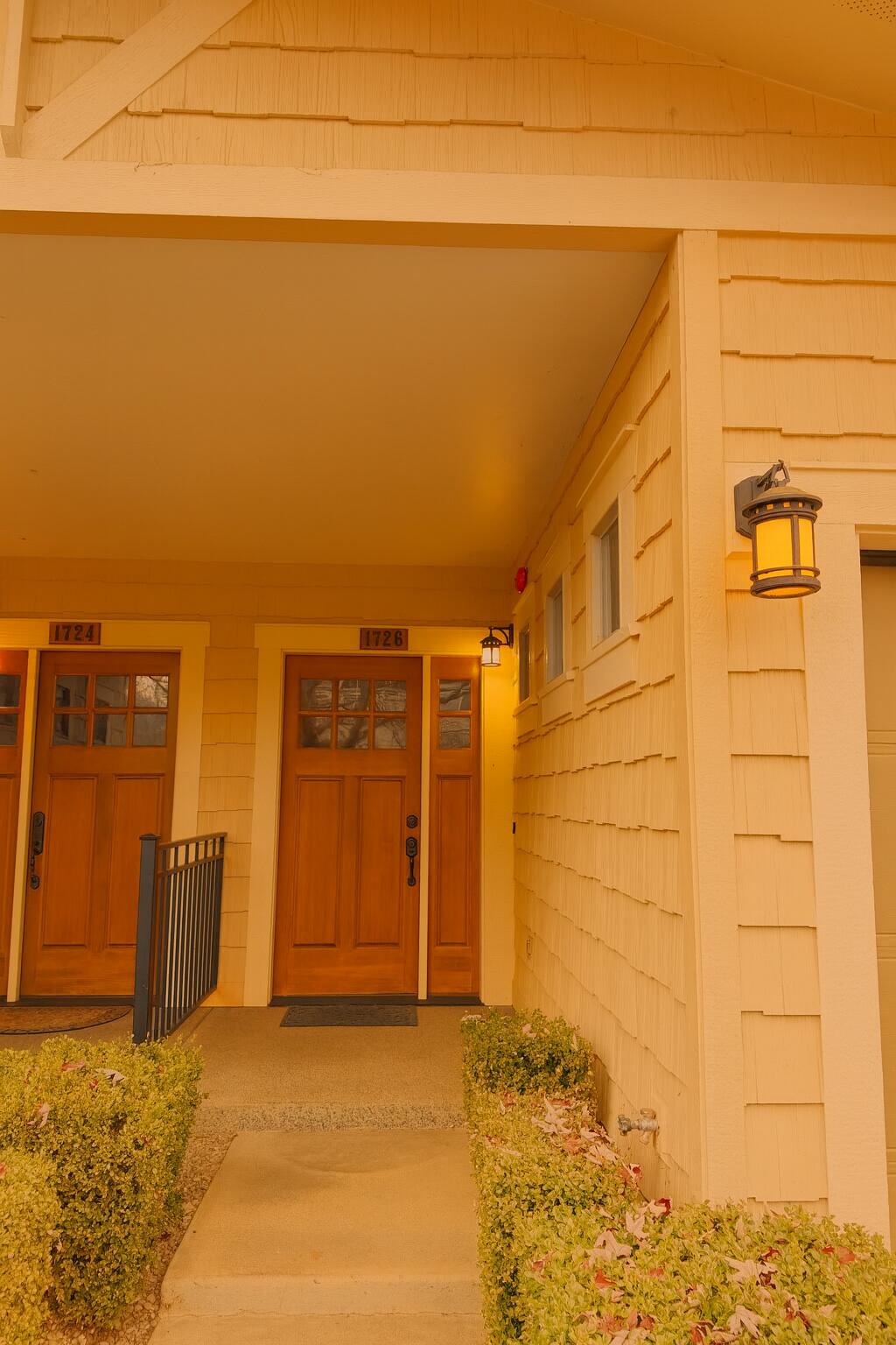 Experience exceptional living in Sequoia Village, recipient of the Grants Pass City Council's 2008 Developer Award for thoughtful design and quality construction. This 2-bedroom, 2-bath townhome showcases top-tier features throughout, including hardwood floors, granite countertops, stainless steel appliances, and 9-foot ceilings on both levels. Tile floors in the kitchen and baths, plus included washer, dryer, and window coverings, make this home move-in ready. Enjoy year-round comfort with a brand-new heat pump for efficient heating and cooling. The fully landscaped grounds and meandering walkways lead to the elegant 1,400 sq. ft. clubhouse with a pool, sun patio, and hot tub—ideal for relaxation or social gatherings. With a nearby city park, grade school, and a low-density layout that allows extra guest parking, this location offers the perfect balance of comfort and convenience. Discover why Sequoia Village remains one of Grants Pass's most desirable communities.