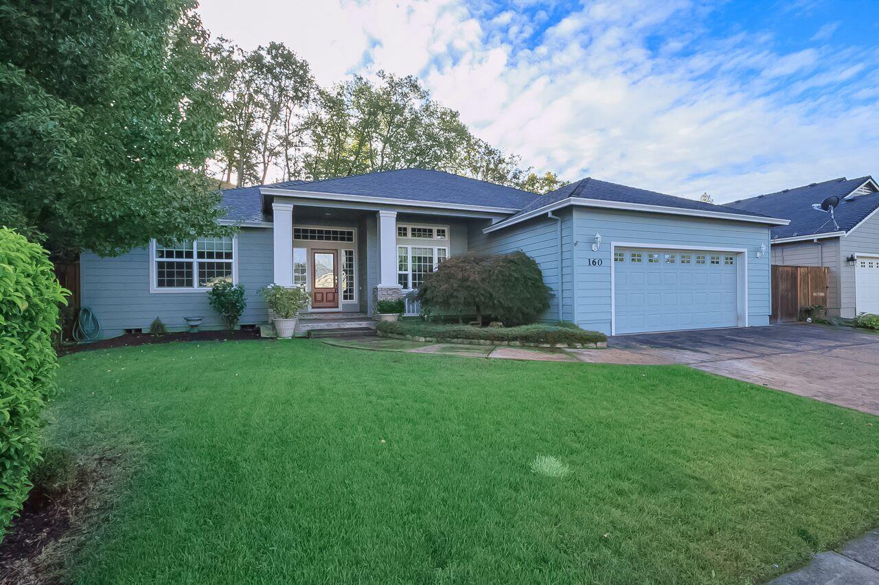 You'll feel like you are on vacation every time you come home to this beautifully built craftsman style home in the lower Eagle Point Golf Community. With a split floor plan, this 3 BR, 2 BA elegant home offers a stamped concrete & covered wide entry, vaulted ceilings and gas fireplace. A spacious great room and open kitchen with granite counters are just the beginning. A large wood floor entrance welcomes you, and you'll be delighted by the large bedrooms and a master suite that provides beauty and comfort. You will love the master bath with soaking tub, walk-in shower and double sinks. You will have all the room you need in your large walk-in closet. Step from the kitchen into a beautifully landscaped private backyard with covered patio and double-tiered rock wall, from where you can see deer grazing. A two-minute walk down the street will take you to the newly built Lucas Park-perfect for walking or hiking. All of this awaits you in a pristine & peaceful neighborhood. It's a
