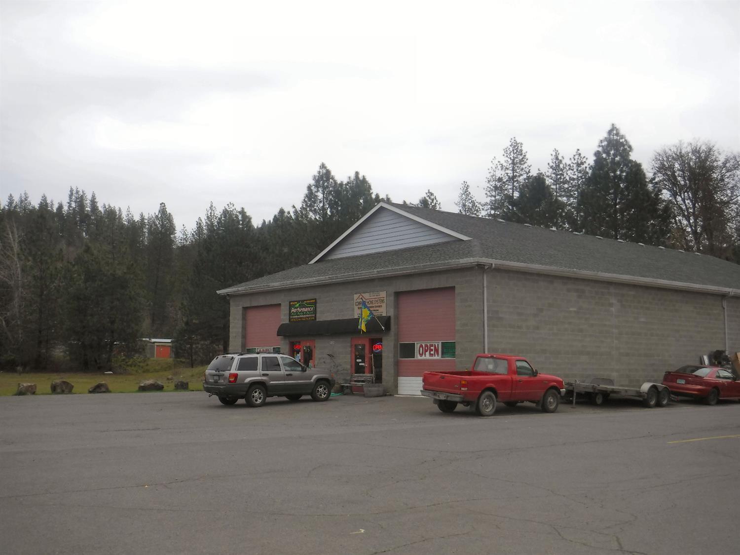 Space B (1,250 sq. ft.) is listed at .60-cents per sq. ft. Concrete block building zoned General Commercial. Great visibility on Highway 62 in Shady Cove.
