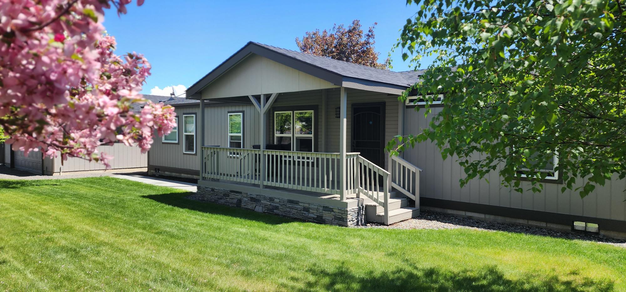 This home is a gem! Nestled along the canal with a park like backyard. The fully fenced back yard has access to the canal hiking path. Great location on the south side of Redmond. Stainless steel appliances, butcher top kitchen counters! Easy access to shopping, dining, airport or Bend. This single level home is clean, light and bright with vaulted ceilings and newer paint, carpet and laminate flooring throughout. Enjoy your additional bonus/den/media room. Fully covered front porch and back deck. Enjoy your beautifully landscaped and fully fenced backyard with canal frontage. Room for RV and recreational-toy parking. Home and garage/shop building (24' x 30') have newer roofs. Relax and enjoy this peaceful haven! See documents for a full list of upgrades.