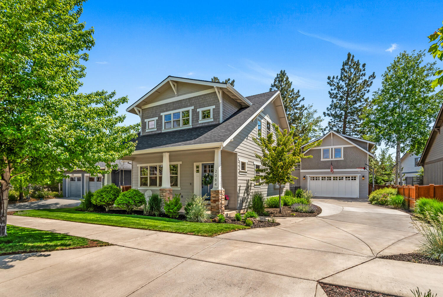 Welcome to this charming bungalow-style home on a quiet Westside cul-de-sac with walkability to NWX, Discovery Park, The Grove, and quick access to nearby hiking and biking trails. The spacious living room with a stone-surround gas fireplace flows into the open kitchen and dining area, perfect for entertaining. The kitchen features a large granite island, stainless appliances, and ample counter space. Upstairs offers three bedrooms and two full baths, including a private primary suite with a walk-in closet. Vaulted ceilings, hardwood, and slate floors add warmth and character. Exterior was painted 2.5 years ago. Detached two-car garage includes extra storage plus a 572 sq. ft. mother-in-law suite with full bath, ideal for guests or rental income. Fenced, landscaped yard with patio is perfect for relaxing or gatherings. A rare find in a highly sought-after location.