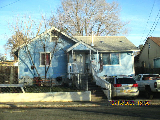Good Investor Opportunity!  Long-term tenant.  2BR/1BA home located near schools, shopping and public transportation. Property needs foundation repairs and the back porch needs to be rebuild.  Sold as-is.  Small garage is in the basement. Also has a small, finished loft.