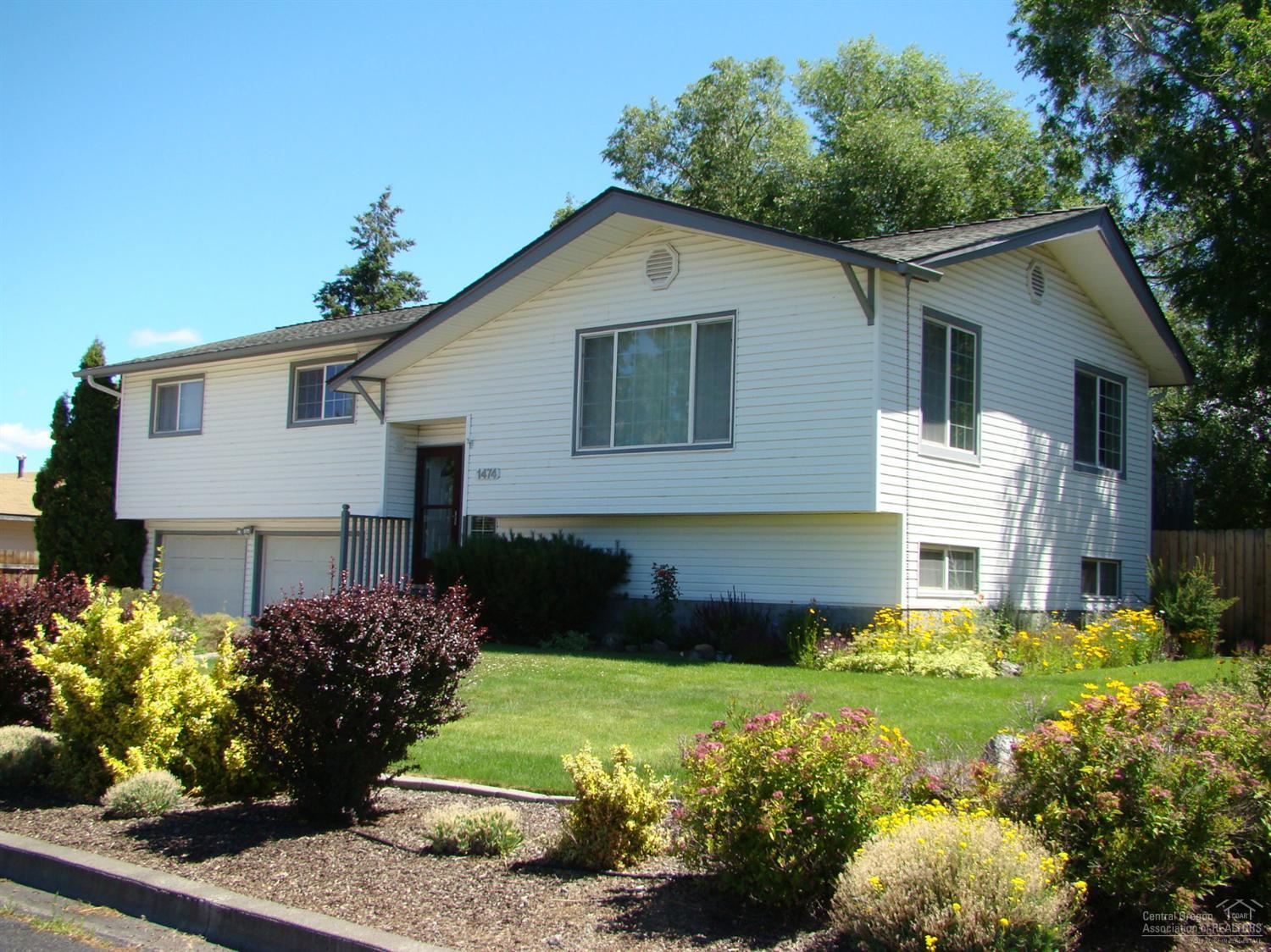 Large home and lot on choice corner location with R5 zoning next to a city park. Extraordinary opportunity for numerous Live-Work home based Biz. uses. All living spaces on main level. Lower level great room with fireplace & 1/2bath has been used for in-home businesses. Plus the shop addition to the back of the heated garage has been used as a daycare center-possible guest house cottage. Asphalted & fenced RV/boat/equipment storage area with rear alley access. Energy efficient systems. So much for the price