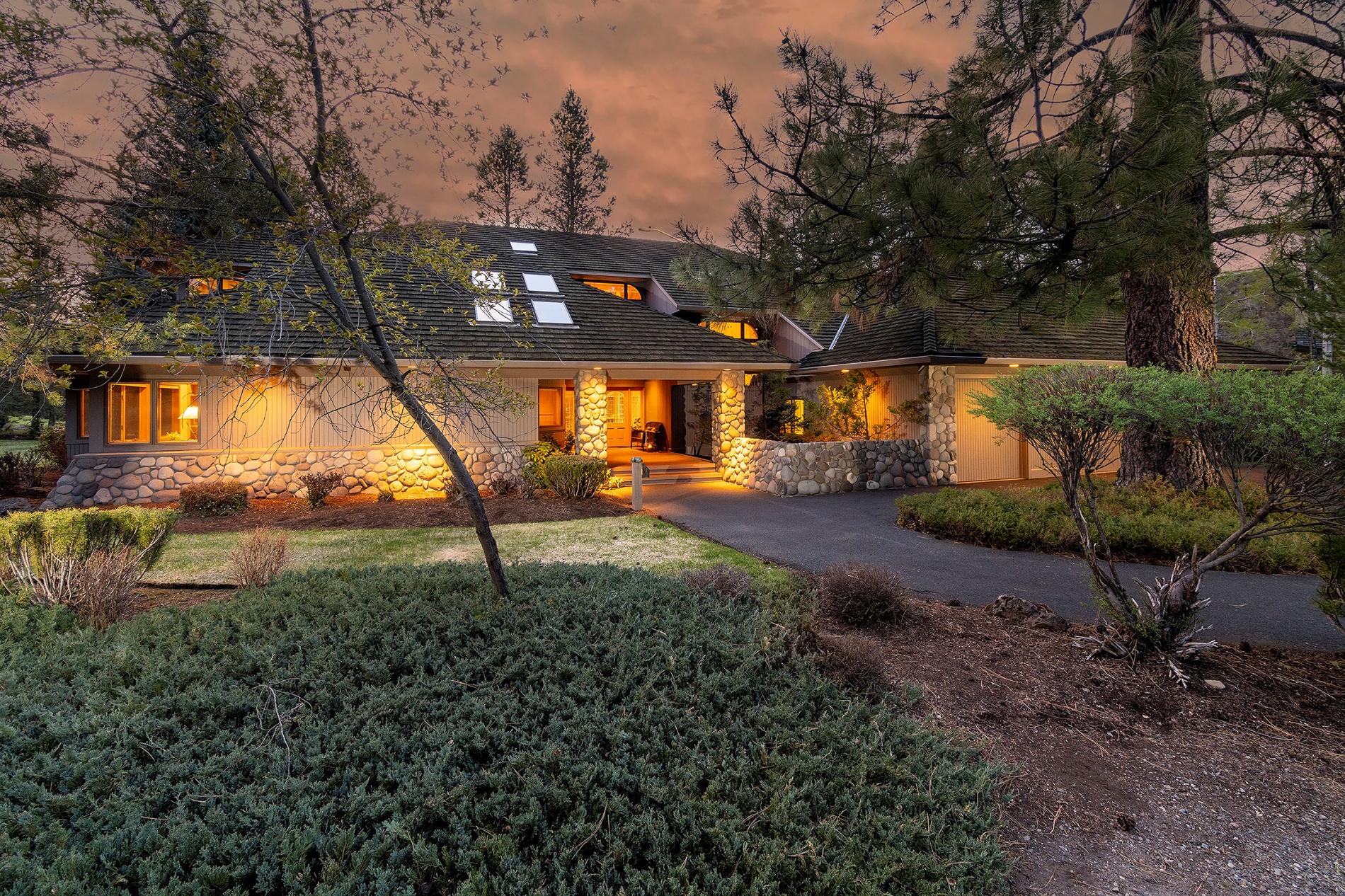 Privacy and luxury await at this premier residence situated on a .72-acre double lot featuring golf course and partial mountain views. This timeless Steve Van Sant designed, Sun Forest built home is beautifully appointed and offers 4,600 square feet of thoughtfully designed living space with 6-bedrooms, 4-full baths, 2-half-baths, office, and bonus areas. Open integration of the kitchen, dining, and main living area with wet bar is ideal for entertaining. Quality craftsmanship and gorgeous architectural elements including soaring ceilings, exposed beams, floor-to-ceiling river rock fireplace, gleaming hardwoods and wood-wrapped windows make this a warm and inviting Sunriver retreat. Enjoy over 300-days of sunshine on the expansive back deck with the 13th fairway of the Woodlands and Mt. Bachelor as the backdrop. Oversized two-car garage with golf cart garage, workshop, and bonus room. Whether you want to get away or get together, create a legacy for your family at 12 Shamrock Lane!