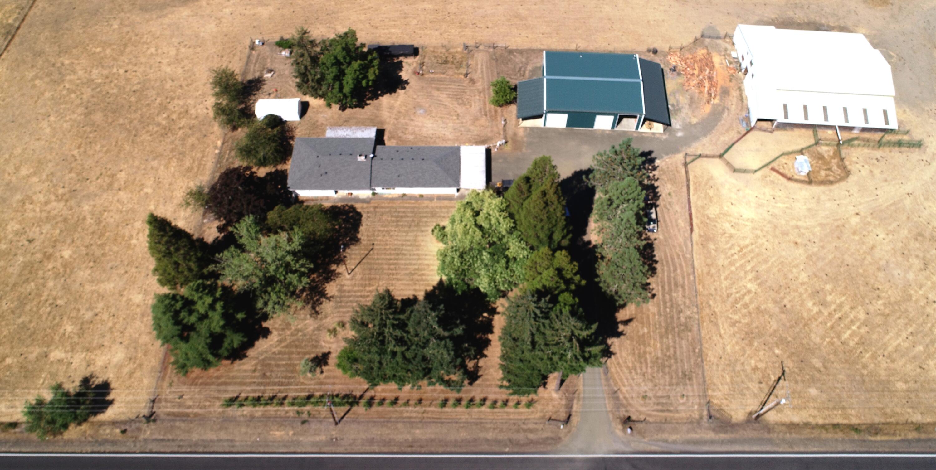 Tucked away in the scenic heart of Douglas County, this 114.55 ± acre ranch near historic Oakland offers a rare blend of productivity and lifestyle. Fertile grass meadows and pastureland support approximately 30 cow-calf pairs, thanks to reliable water resources that include year-round creek frontage on Calapooya Creek, a fenced reservoir and highly productive meadows. Two residences, a horse & cattle barn, working corrals, a hay barn, equipment shed and multiple out-buildings make this both a productive cattle operation and a comfortable retreat. hunting, and fishing opportunities abound with
black-tailed deer, mallard ducks, Canada geese and plentiful wildlife. With a mild Southern Oregon climate and close proximity to the Umpqua Valley, Umpqua National Forest and the Oregon Coast, this property is ready for work or play, agriculture, recreation, equestrian or multigenerational living.