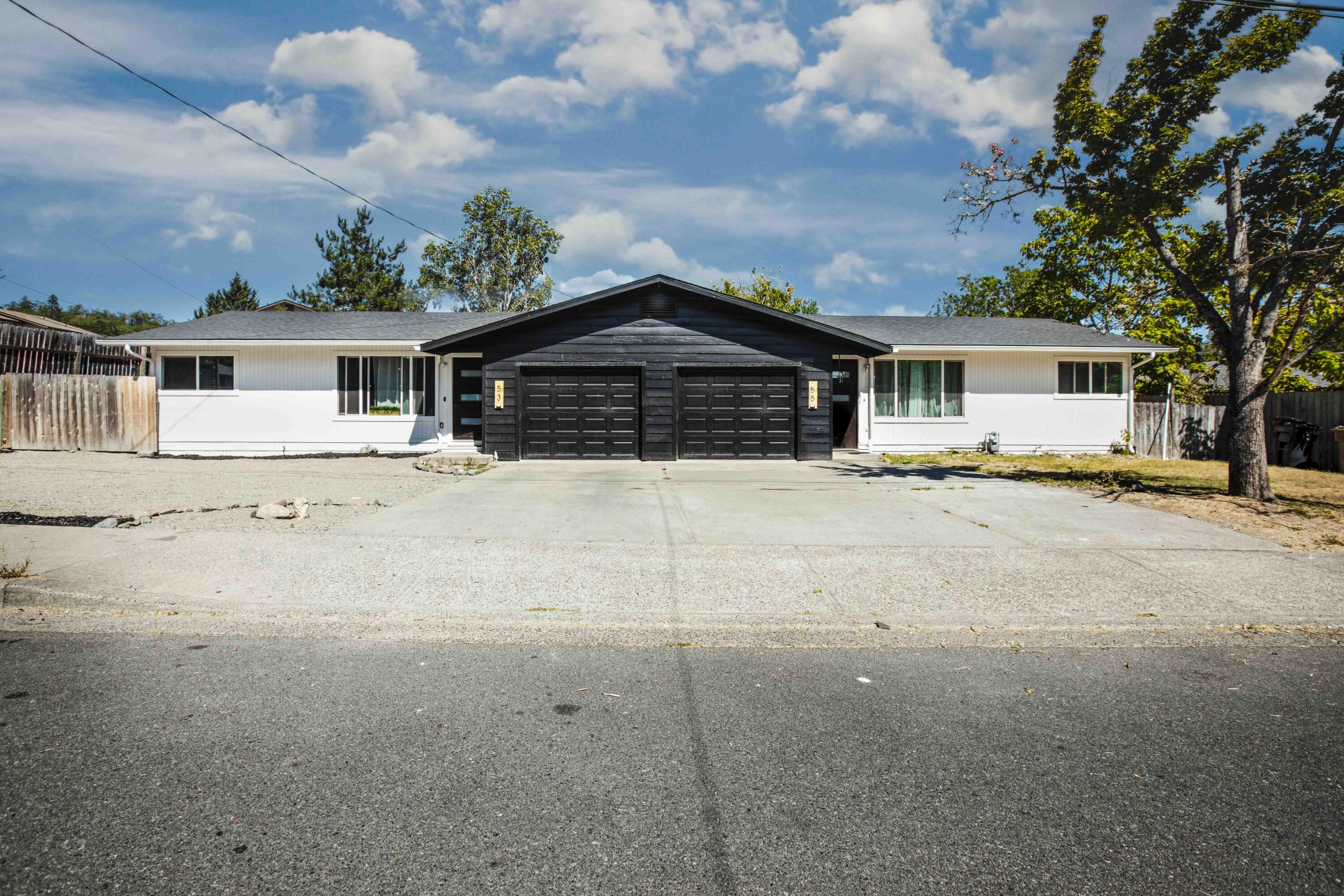 This property is conveniently located near schools and shopping destinations. Each unit includes 2 bedrooms and 1 bathroom, providing comfortable and efficient living spaces, with a total of 1,676 square feet. Both units have been completely remodeled inside and out, with fresh paint, brand-new laminate flooring, new mini-split air conditioning and heating system, ensuring year-round comfort and energy efficiency.  The kitchens include new cabinets and stone countertops. Each unit also includes its own attached 1-car garage. Laundry has been relocated inside each unit from garage(s).
The exterior features a new roof, gutters, vinyl windows, fresh paint, and new doors.
These units are ready for you to start generating income. Whether you're an investor looking for a great rental opportunity or a homeowner wishing to live in one unit while renting the other.