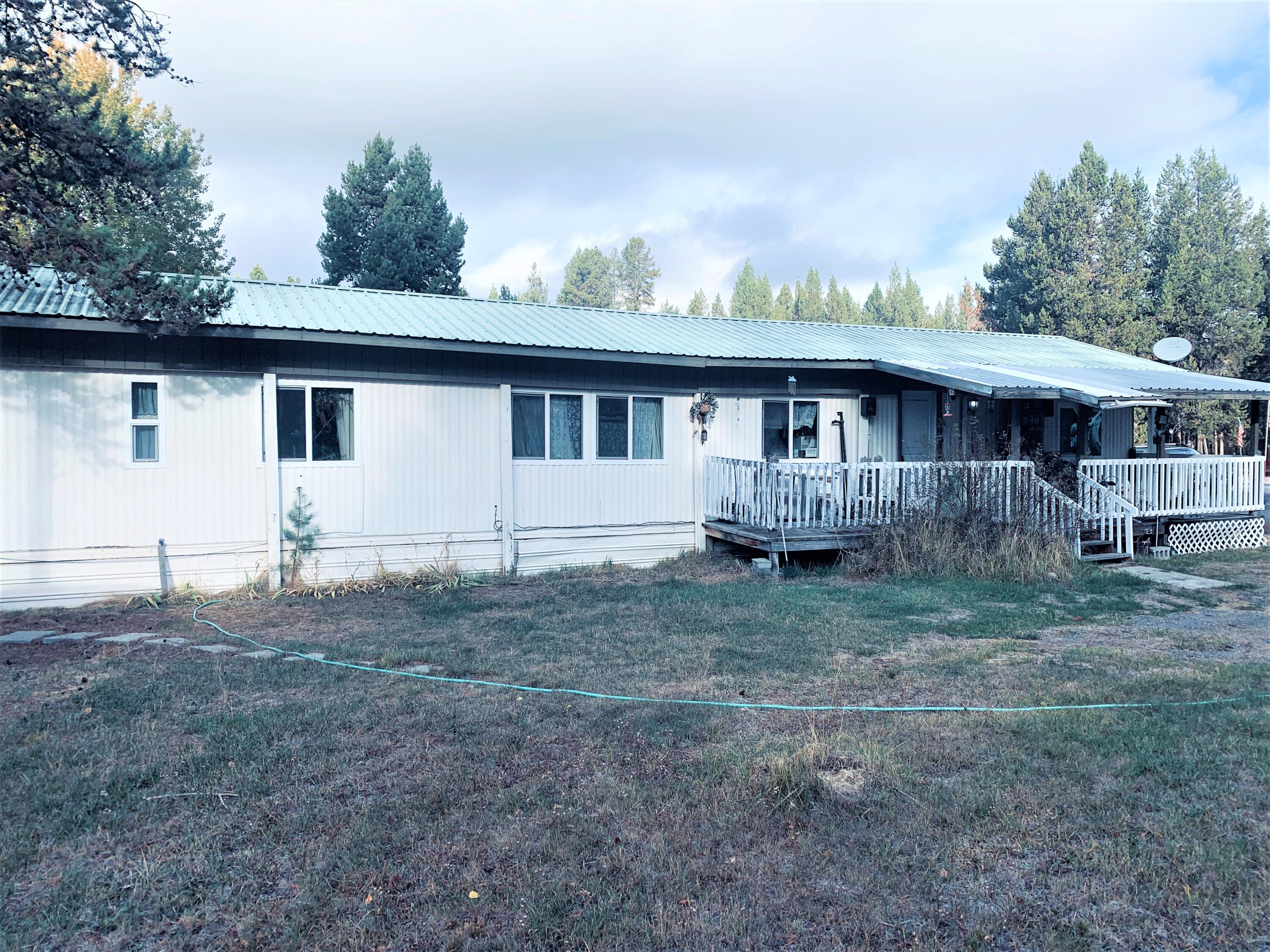 Great find in Crescent -Home needs some TLC to bring it back to life-Great space with fenced backyard Garage/shop for storage-corner lot-RV parking with rv dump and hook up-newer vinyl windows-porches on 3 sides -close to schools, post office, fire dept.- bus stop across street-quiet neighborhood-Natural gas is available