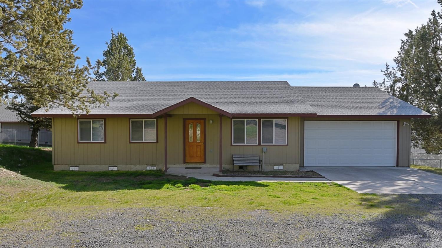 Enjoy all the amenities of Ochoco West in this bright, clean and well maintained home. Open kitchen w/breakfast bar. Great room vaulted ceilings, partially fenced, large garage, Extra or RV Parking, new interior paint. Community Center, seasonal swimming pool, horse stables, shooting range, private fishing reservoir and Access to BLM for hiking & ATV's.