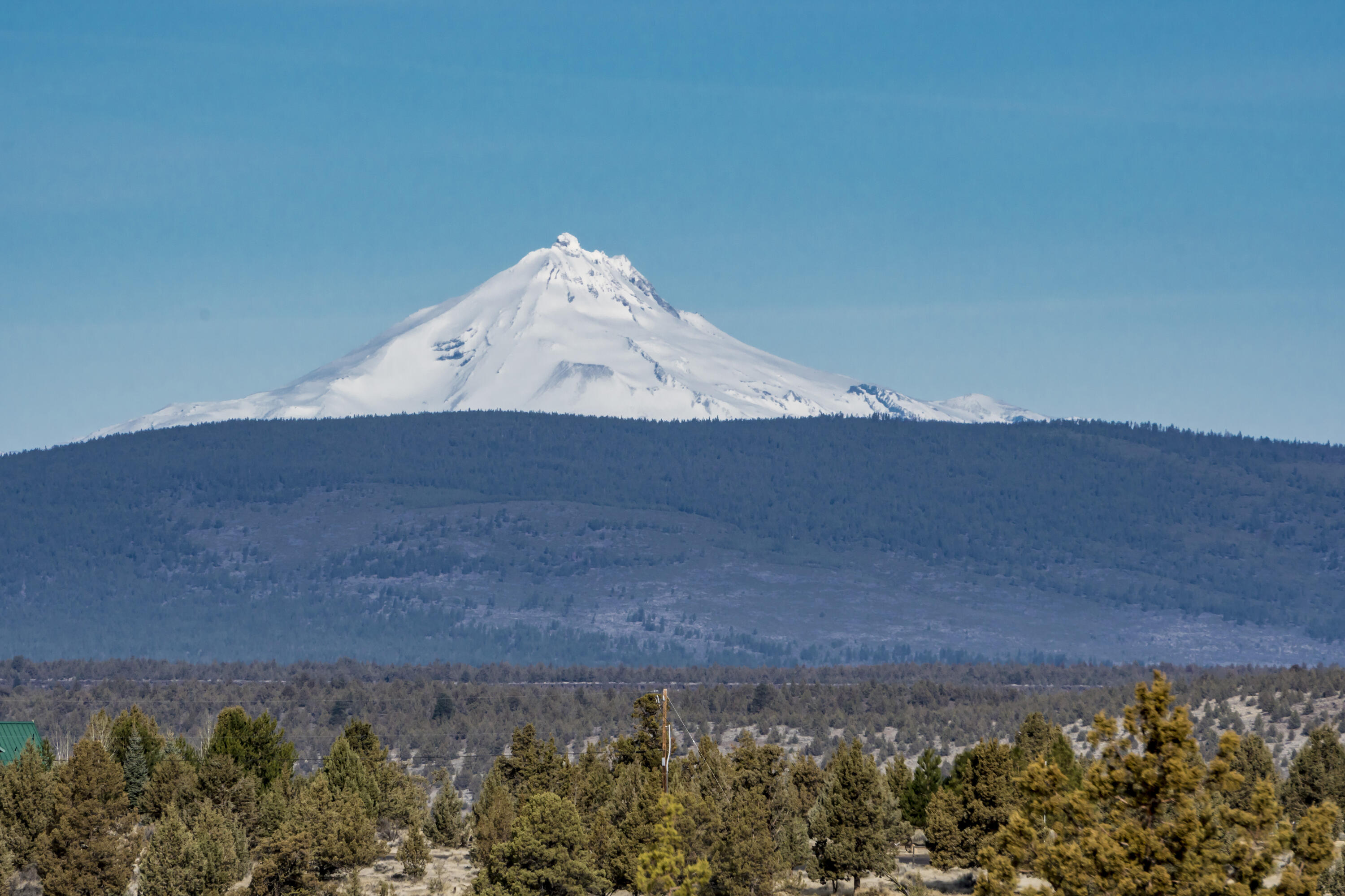 Panoramic Cascade Views from a gently sloping 8.7 acre buildable lot that borders BLM land w/direct access to the Deschutes River, septic approval, a driveaway installed, & power at the road. The property is in one of Central Oregon's premier small acreage neighborhoods, Lower Bridge Estates, & is only 10 minutes from Terrebonne, 15 minutes from Redmond, 30 minutes from Bend, 20 minutes from Sisters, & on a paved road. Access throughout the neighborhood to public lands & the Deschutes River is second to none & the plethora of outdoor recreational opportunities right out your front door are world class. You can walk to the river in countless locations. The trails don't allow motorized access but hiking, biking, & horseback access are permitted. Below 84th Ct in the neighborhood you can float on tubes to Lower Bridge. Watch the attached video tour for aerial footage, a walkthrough w/explanation of the property, & tours of the surrounding public land/river access via foot & mountain bike