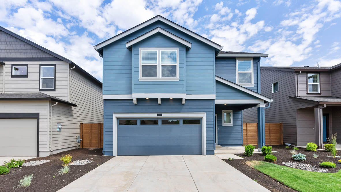 Closing cost and low interest rate incentive available with use of Builder's lender. Visit Monrovia in Bend, a charming community near Sun Meadow and Alpenglow Park, offering easy access to nearby shops, restaurants, and schools. The Pacific two-story floor plan has 4 bedrooms plus a huge bonus room, 2.5 bathrooms & a den on the main floor that is perfect for guest stays or an at-home office. The open concept living space has modern finishes throughout with luxury vinyl flooring, a cozy fireplace in the great room, and a chef-inspired kitchen with outstanding features such as stainless-steel appliances, solid surface countertops with backsplash, and a gas range/oven. The primary features a double vanity sink, spacious shower, and a large walk-in closet. Open Wednesday, Thursday, Sunday 10 - 5:30.  Photos are representative of plan, features/specs may vary.  Model home located next street over at 20592 Button Brush Ave.