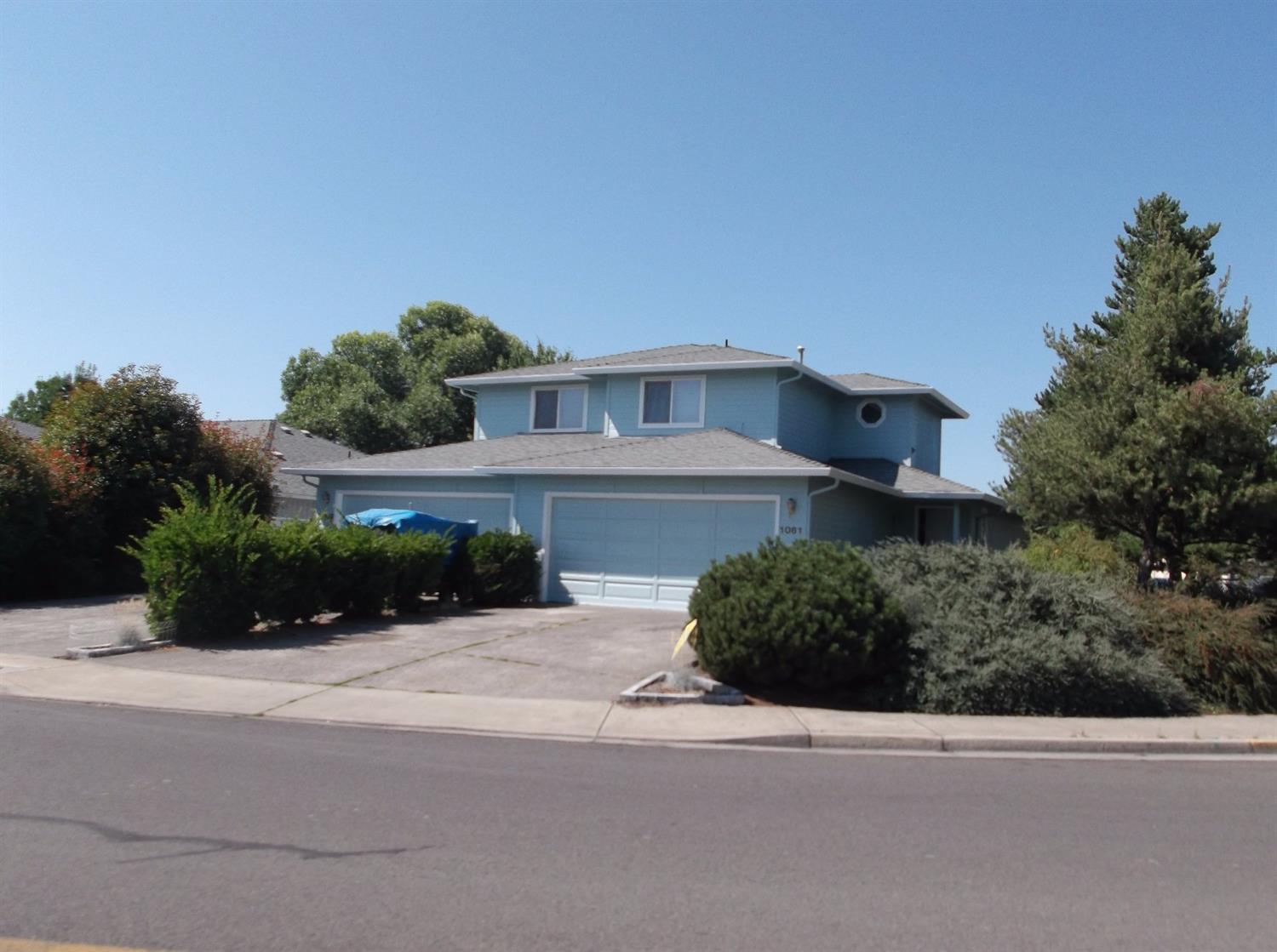 Well maintained duplex in a great Central Point neighborhood on a large corner lot. Each unit has 2 bedrooms, 2 baths, 1105 sq. ft. and a 2 car garage. The floor plan has an open living, dining kitchen area, a full bath with lots of storage cabinets. Upstairs there is a master bedroom with a walk-in closet and a second bedroom. Homes have washer/dryer hookups in the garages, gas heat and central air conditioning. Each unit has a fenced yard with patio, lawn, flower beds and a six ft. privacy fence. The side yard is bordered with mature flowering bushes, trees and evergreens. Both units are currently occupied with great tenants. Property is close to park, elementary school and shopping.