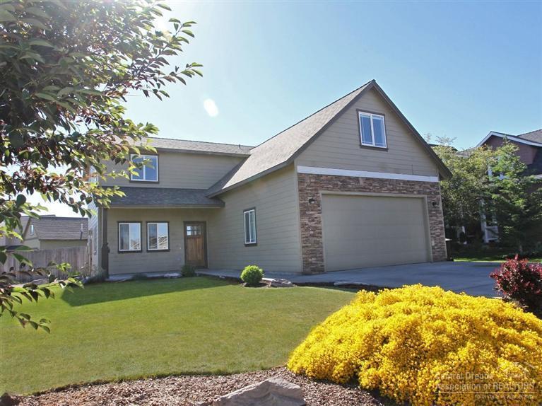 Nice family home with great curb appeal. Great location that is close to schools, Hospital, shopping and Dry Canyon Park. Master on the main with 3 more bedrooms upstairs along with a huge bonus room. Tile counter top and hardwood floors. Tile counters and floors in the bathrooms. Fireplace in living room. Fully fenced backyard for entertaining and room for an RV. Plenty of room for the whole family.