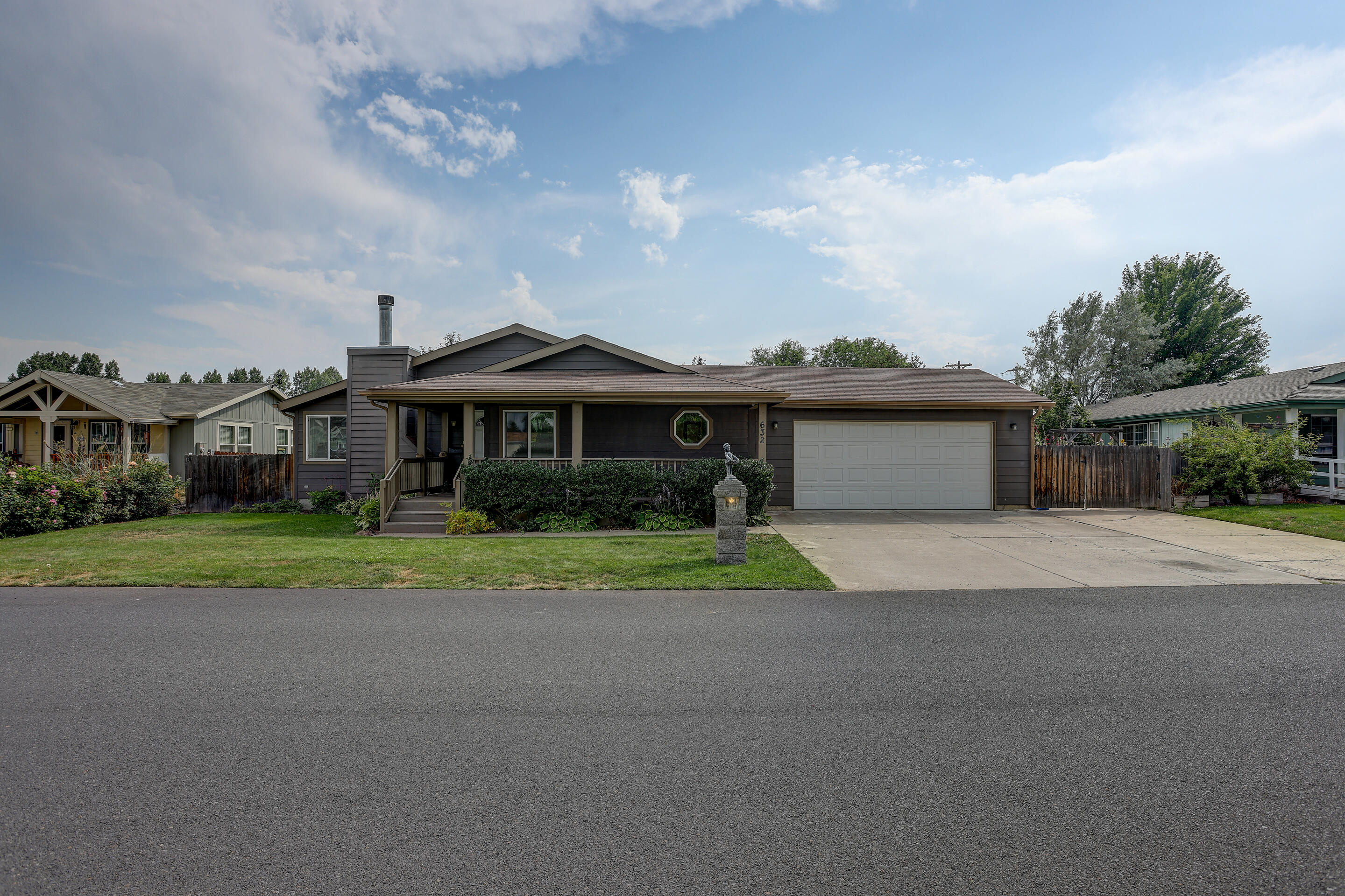 Pride of ownership shows in this 3 bedroom, 2 bath 2249 SF, 2003 triple wide manufactured home on .19 of an acre w/ 30+ ft of RV parking, 2 car attached garage w/ AC. This open concept floor plan has a family room w/ wood burning fireplace, dining room, pantry, laundry room, large kitchen w/ island, breakfast bar, living room w/ floor to ceiling windows, remote patio roll down shade, vaulted ceilings w/ skylights, office area off of the living room & master suite w/ walk in closet & soaking tub. The fenced backyard is extra private w/ water feature, pergola & a gate to access the common area located behind the home. Call today for more info!