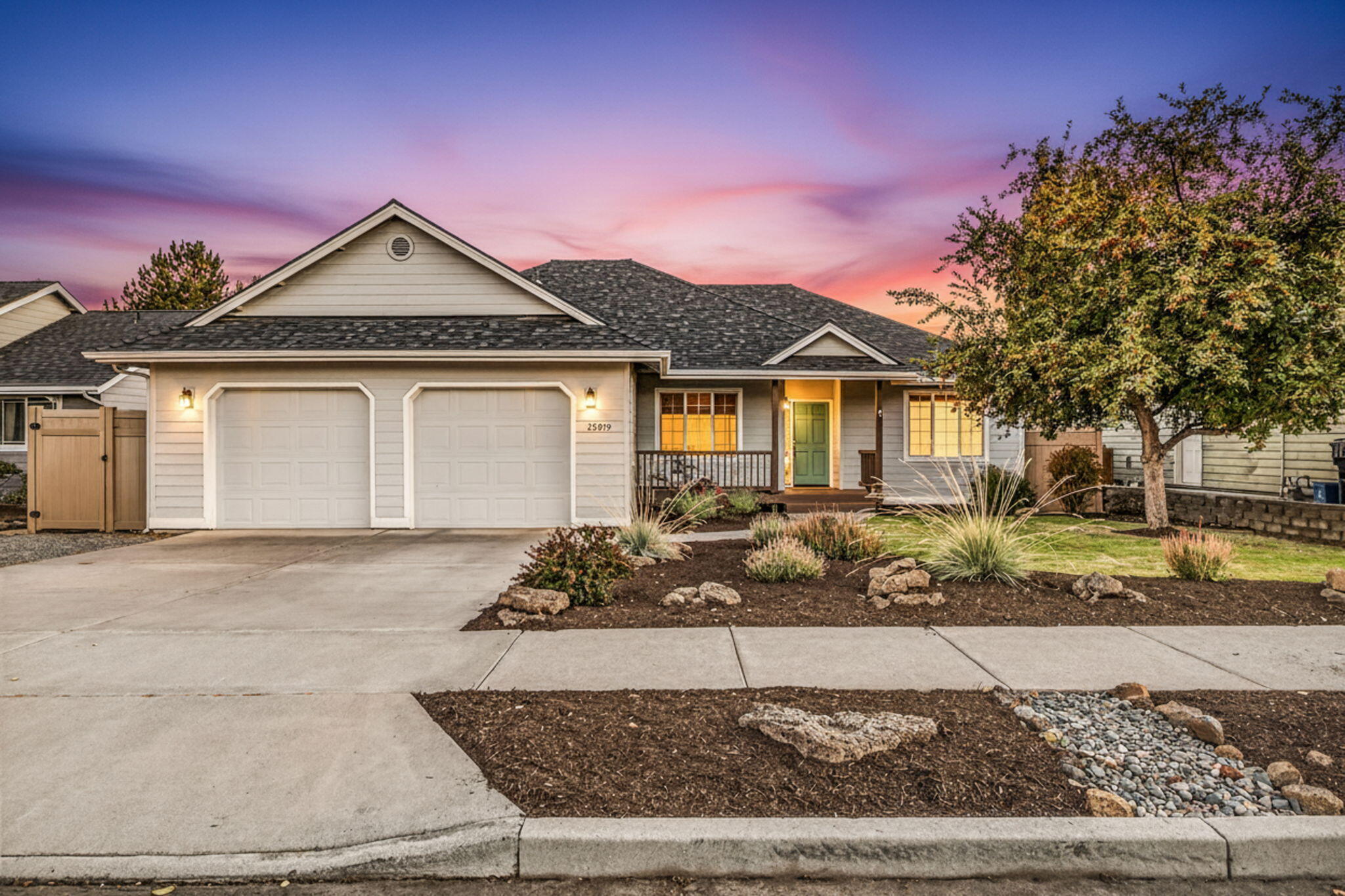Tucked away in the desirable Terrango Glen neighborhood of NE Bend, this single-level, move-in ready charmer offers exceptional privacy, comfort and accessibility to all that Central Oregon has to offer. Featuring 4 bedrooms and 2 bathrooms, this home showcases fresh landscaping and an inviting great room layout. The spacious primary suite includes a walk-in shower and a separate soaking tub for a relaxing retreat, while the oversized two-car garage provides ample storage space. Enjoy abundant natural light throughout the day, thanks to the home's south-facing rear exposure that brightens the central living space. The open-concept kitchen and dining area flow seamlessly to a large back deck—perfect for entertaining or unwinding while overlooking the peaceful, well-kept yard. Recent upgrades include a newer roof (2022), Water Heater (2024), HVAC (w/ NPI Ionizing Air Cleaner), AC (2024), and CAT6 wiring (2024) all adding peace of mind and value. Welcome home!