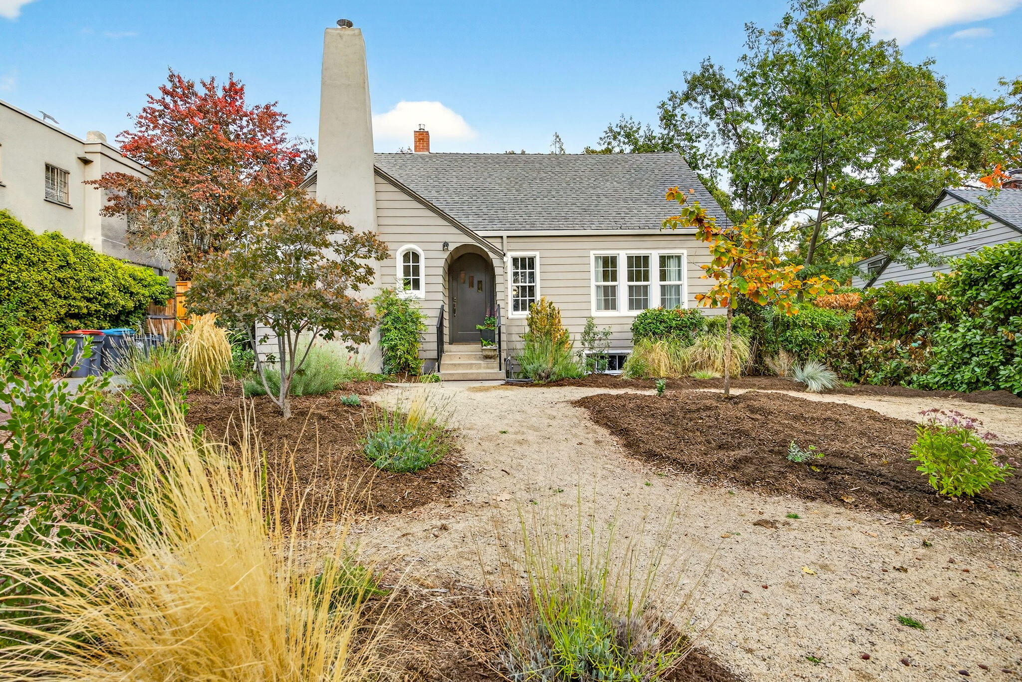 Old East Medford Charmer!  This beautiful updated 1920s home includes a detached 500 square-foot ADU that has historically rented for $1250 to 1400 a month in this highly sought- after neighborhood. Perfect for added income or guests.  The main 4-bed, 2- bath residence offers 1884 ft.² of timeless charm in modern comfort with restored hardwood floors, remodeled bathrooms, new carpet, and fresh interior and exterior paint.  Two bedrooms and baths on each level plus a versatile upstairs bonus room provide flexible living options. The one car garage doubles as a heated workshop with water and a workbench.  A 708 sq ft. basement (not in total square footage) offers great storage or future potential.  Set on a landscape lot with a carport and mature trees, this home combines vintage character with modern convenience in the heart of Old East Medford.