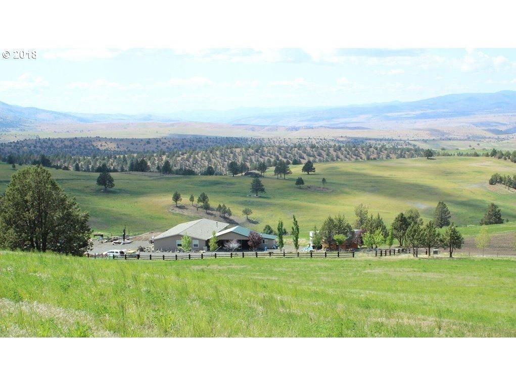 Beautiful home on a breathtaking view property. Home is placed out of sight for complete privacy. Property is located on Angel Gulch boasting 7 springs throughout the property. Deer, Elk & Antelope. Property is fully fenced, much of it planted in grass and alfalfa. This land can be dry land farmed, used as pasture. Seller will consider acceptable trade or Owner carried contract with acceptable terms and conditions.