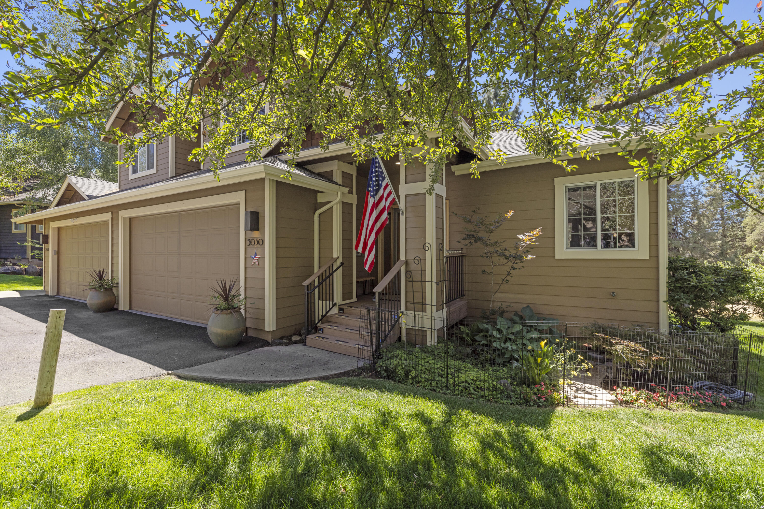 Immaculate townhome located in the incredible Running Y Resort! This property has been tastefully upgraded, and has a custom primary bathroom unlike the other townhomes in the area. The kitchen features complete granite slab counters, backsplash, tops of the line stainless steel appliances along with a unique and modern two tone Refrigerator. The downstairs flooring has all been upgraded to a lvp, and the primary bathroom was completely remodeled to provide a large walk in shower as well as additional floor to ceiling storage cabinets. Dual vanity sinks with an additional countertop vanity as well. The deck is private yet also features great views of the trees and area behind the home. Primary suite and bath are on the main level of the home. The HOA covers landscape maintenance, snow maintenance and removal, and provides access to the Fintess Center and Pool! This is a upper clean townhome that is a must see, and will surely impress!