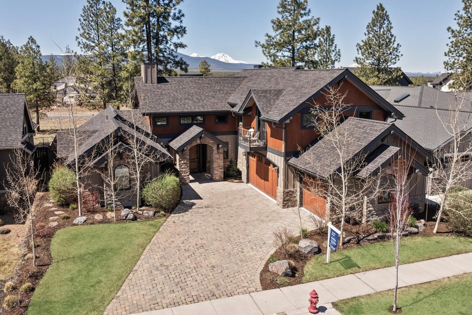 Move right in & enjoy Central Oregon from this conveniently located home in NW Bend! Situated on a beautifully landscaped lot, owners get to spend balmy summer evenings on the patio around the firepit
entertaining guests & winters in the great room cozying up in front of the grand stone fireplace. The main level primary suite is located in its own wing and offers a jetted tub, rock fireplace & large walk-in closet. Upstairs are two more bedrooms with walk-in closets, a loft area that functions well as an office space or workout area and a large bonus room with its own balcony. This truly is a very functional & easy home to live in, it has been well maintained and is ready for new owners! One of the Sellers is a licensed realtor in the state of Oregon.