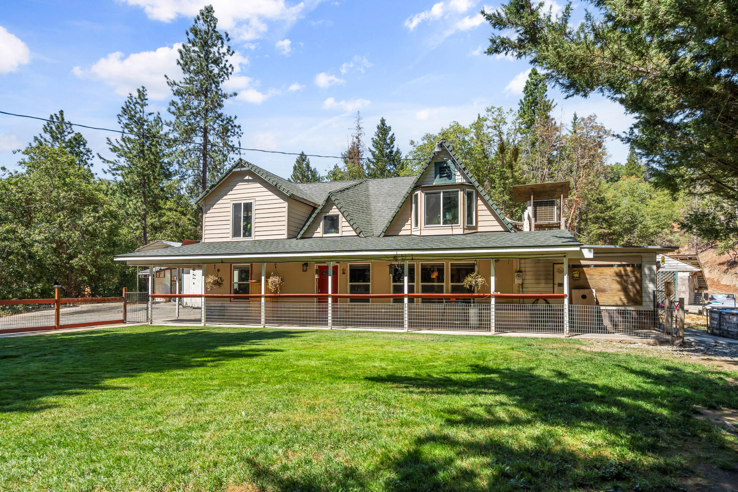 Looking for space, privacy, and a home that truly feels like a retreat? This 5-bedroom, 2-bath residence on nearly 10 acres offers just that. With over 2,100 sq. ft., it features a spacious kitchen, cozy living areas, and a charming clawfoot tub upstairs. Step outside to enjoy your fenced yard, patio, fire pit, and wooded acreage—perfect for gatherings or quiet evenings under the stars.

And there's more—this property also includes a newly built 700 sq. ft. ADU with 1 bedroom, 1 bath, and loft space, ideal for guests, multi-generational living, or rental income.

Homes like this don't come along often. Come see it in person and experience the lifestyle it offers!

Buyer to perform their own due diligence regarding all aspects of the property.