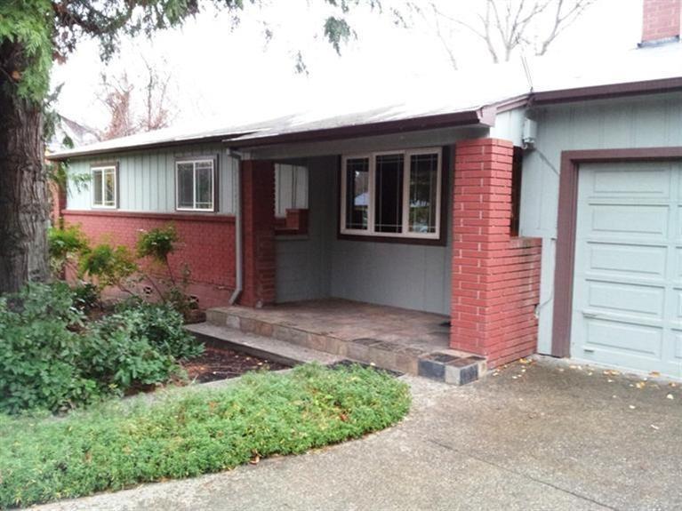 Fetching Prairie-style mid-century home located above the boulevard but not up the hill. Updated with hardwood floors, cherry and maple cabinetry, granite and limestone counter tops, double-paned windows and more. Gas fireplace, new carpeting, newly refinished wood floors, and new electric panel. Furnace serviced, ducts cleaned. Really nice lot with mature landscaping and fruit trees. Quite a find.