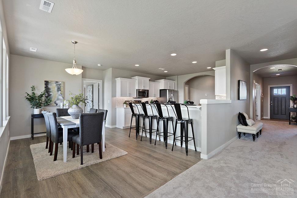 The award-winning<b>Snowbrush</b> floor plan in the <b>Northpointe</b> community! This efficiently-designed, oversized single level home offering both space and comfort. The open kitchen is a chef's dream, with a large island, plenty of cupboard storage and counter space, pantry and breakfast bar. The expansive living room and adjoining dining area complete this eating and entertainment space, with the added appeal of a covered patio area off of the great room. The spacious and private master suite boasts a dual vanity bathroom with extra counter space, separate shower and soaking tub, plus an enormous closet. The other three sizable bedrooms, one of which can be utilized as a den or office, share a second bathroom with a dual vanity. Finishes in photos may be different. Estimated completion May/June 2020!