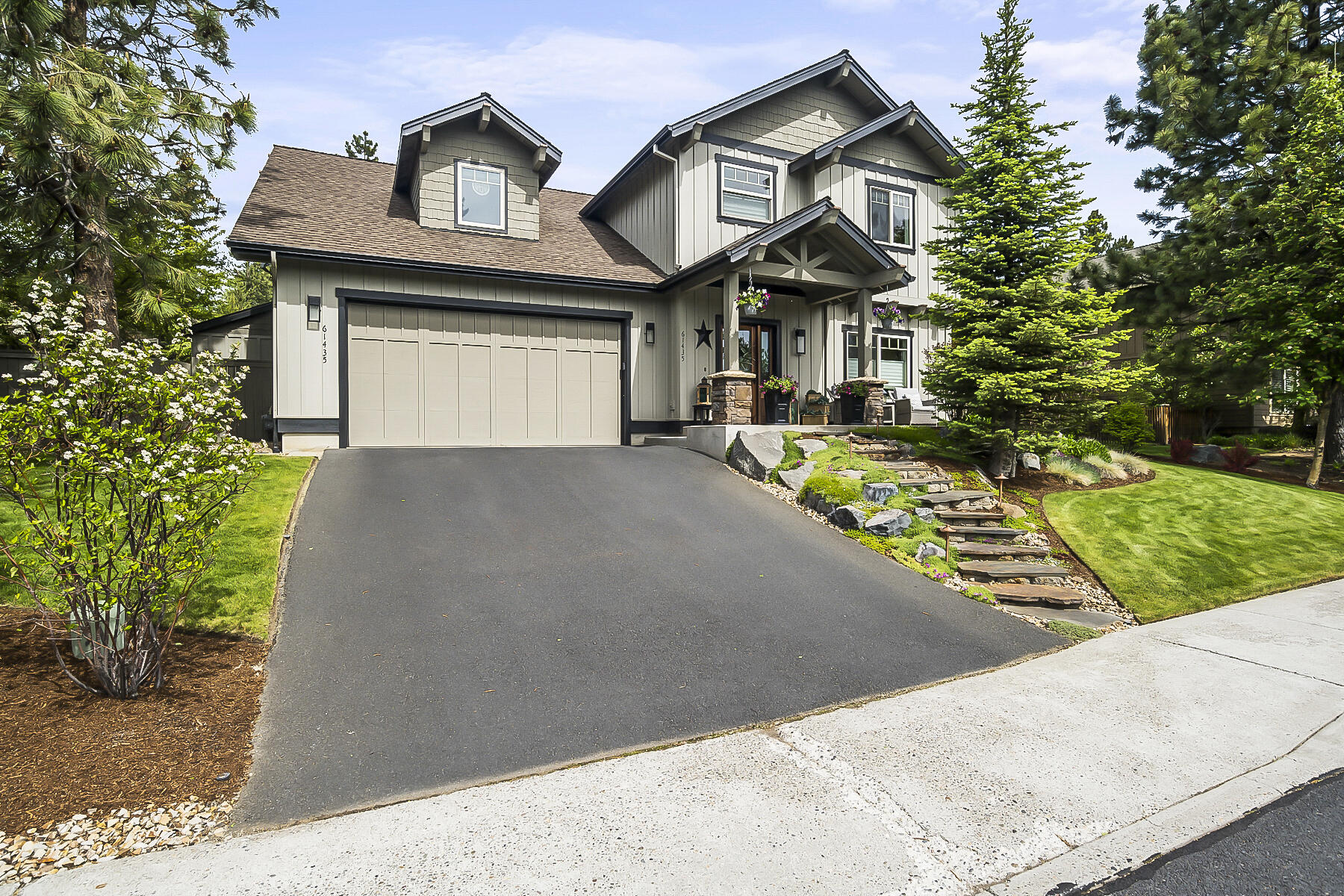 Beautifully updated home in quaint Sagewood development on Bend's West side!  Walking distance to the Old Mill and river trail, mountain biking out your front door, and 20 minutes to Mt. Bachelor! This home has it all including custom finishes, professional appliances, open floor plan, oversized 2 car garage, tons of storage including an outdoor storage building, large bonus room, exceptional privacy, gorgeous landscaping, and a location that cannot be beat! On the main level you will love the wide plank engineered flooring and a beautiful gas fireplace with El Dorado floor to ceiling stone and custom built-ins. The kitchens boast professional GE monogram 30 in gas range and refrigerator, along with a Miele dimension smart dishwasher, quartz counters, breakfast bar and designer tile backsplash. Enjoy relaxing this summer in the private backyard complete with paver patio, walkways and 2 covered patios. Additional features include new carpet, surround sound, central vacuum and more!