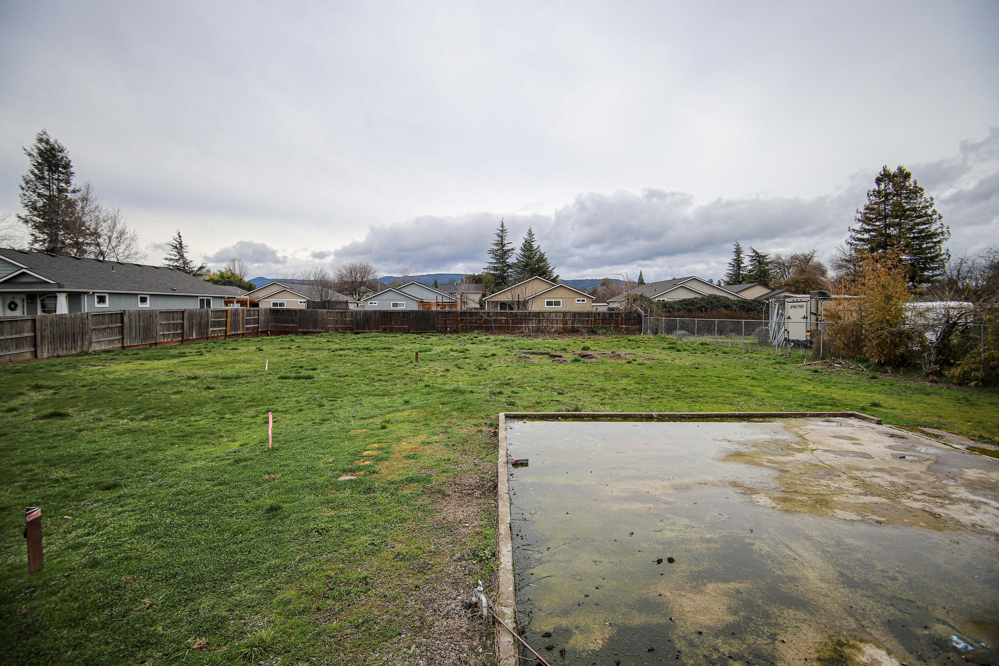 This .13 acre residential lot is zoned SFR-6.  Listing agent is related to selling company's manager.