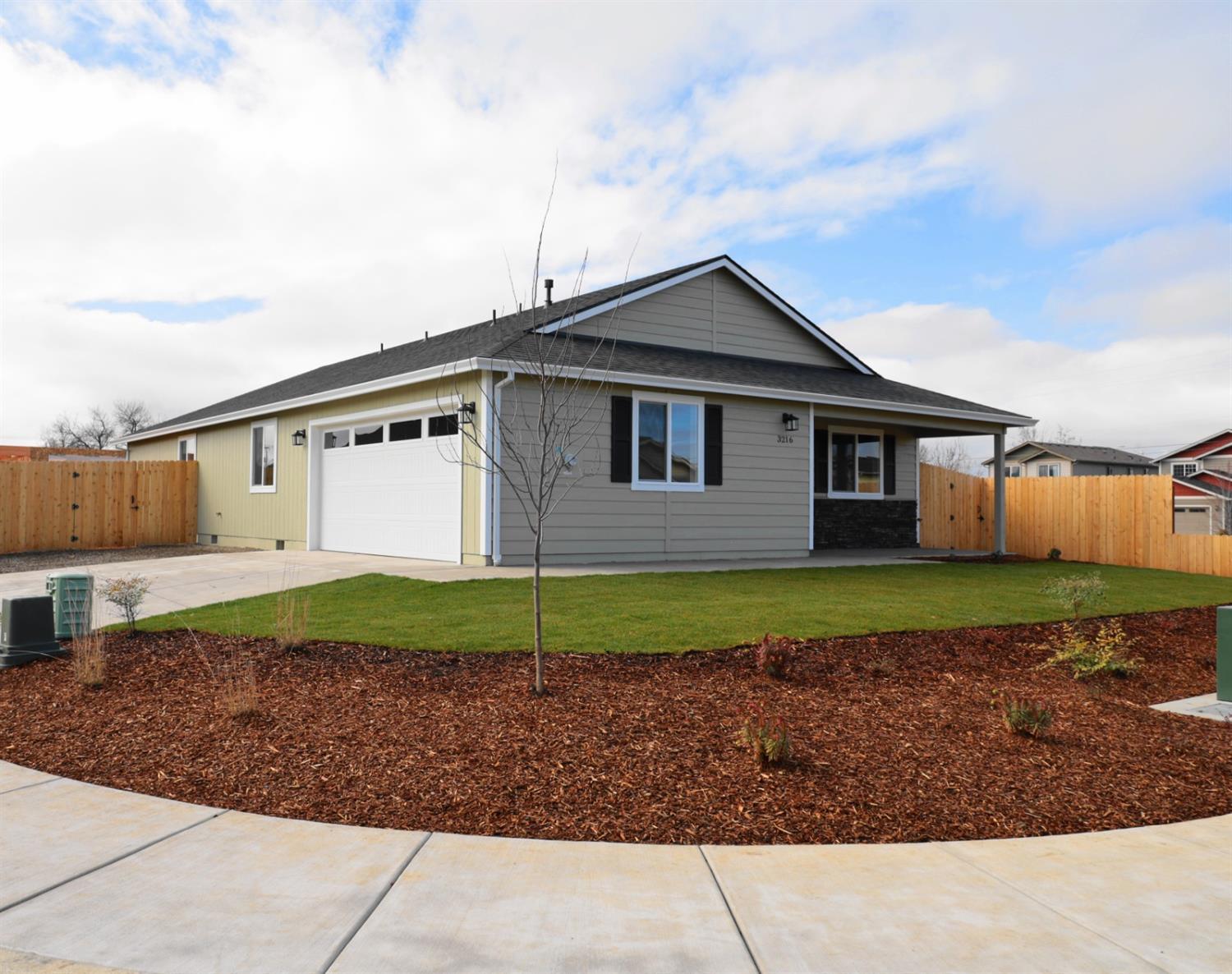 Brand new Quality Construction !! Awesome opportunity to own a newly constructed home that is 1612 Sq Ft with 3 beds 2 full baths with a great design open concept.! High caliber construction. Appliance package including custom cabinets, dishwasher, microwave, and a gas stove/oven combo! Living space includes hardwood flooring, with a nice heating and air system for maximum efficiency! Double insulation in the walls block out noise and keeps the home super cozy. Nice master bedroom has vaulted ceiling with fan and a walk-in closet! This home comes with an attached 2 car finished garage on a large corner lot. Affordable in an up and coming neighborhood surrounded by newer homes with a builders warranty!