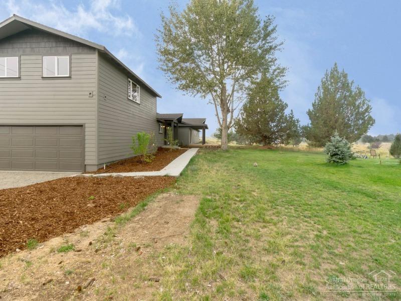Newly remodeled home on large 1.98 acre lot with beautiful views of the Cascade Mountains. Entire home was remodeled this year and features 4 bedrooms, 2 baths, great floor plan w/ huge dining area & slider to new patio area, wood cabinetry throughout, large bonus room, master bath w/ double vanity, soaking tub & large shower stall, attached 2-car garage & 1.8 acres of irrigated land. Great location with close access to Eastside shopping & amenities!
