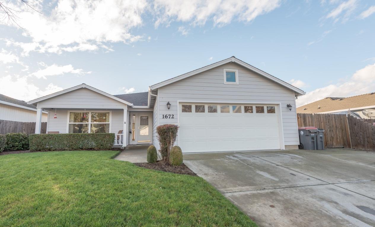 One owner home in a great SW Medford location. Close to South Medford High School. Nice homes surround this well-built home w/2x6 construction. Gas heat & central air cond, open kitchen w/island that opens to dining rm & great rm w/archways & a nice lg entry way w/wood floor, covered porch, + a lg. covered patio in backyard, fenced w/privacy hedge in back. Good sized master walk-in closet, indoor laundry rm, w/storage cabinet, 2 car finished garage w/remote opener.
