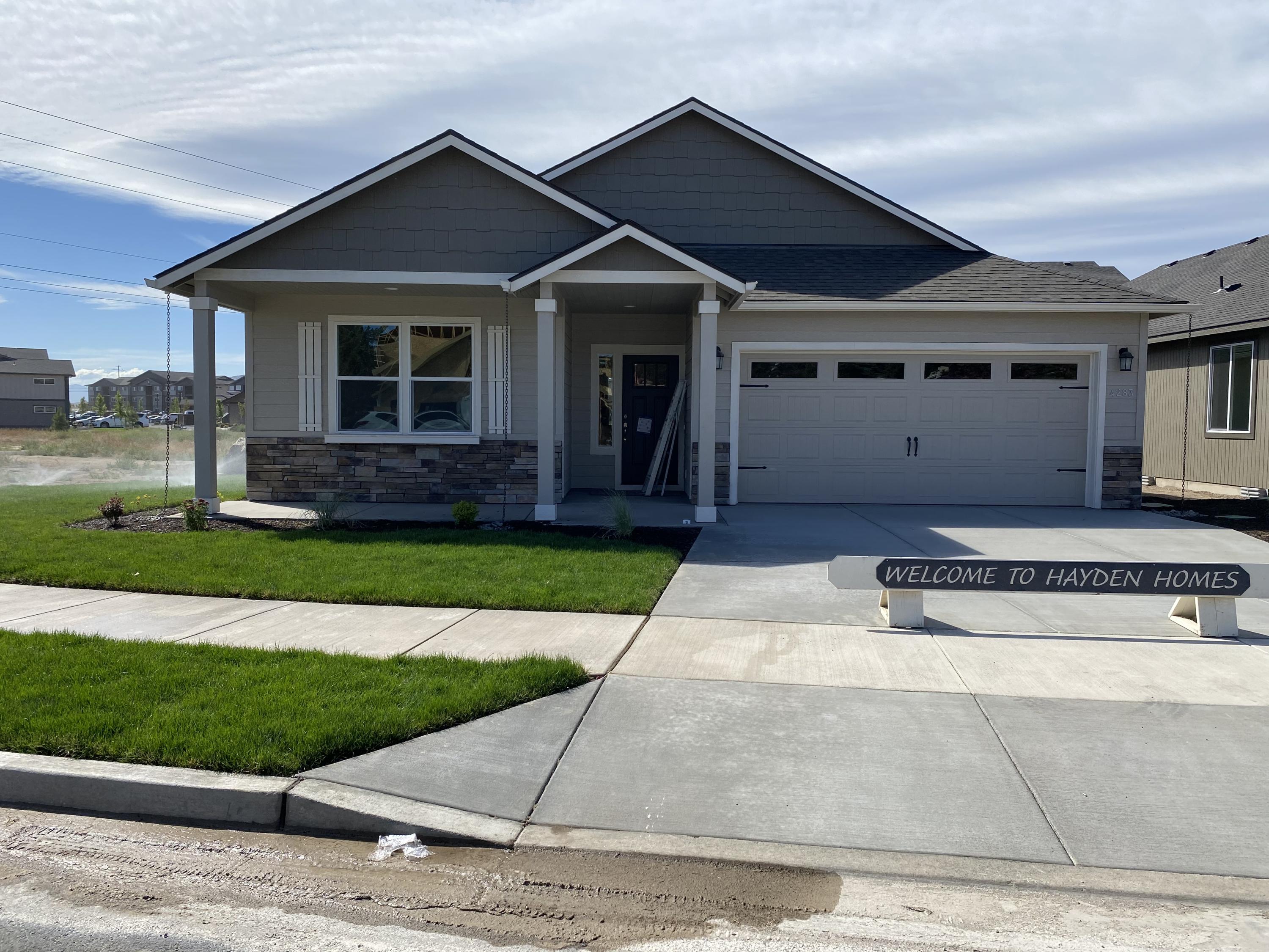 MOVE-IN READY! This home was to be our model home in Village at Ridgeview, but we are no longer going to use as a model.  The Orchard built by Hometown builder of 30 years Hayden Homes is an efficiently-designed, mid-sized single level home offering both space and comfort. The open kitchen is a chef's dream, with counter space galore, plenty of cupboard storage and a breakfast bar. The expansive living room and adjoining dining area complete this eating and entertainment space. The spacious master suiteboasts a dual vanity bathroom, separate shower and an enormous closet. The Village at Ridgeview community in southwest Redmond offers an unbeatable new home value in Central Oregon. Featuring larger homesites, a prime location in an up-and-coming part of town & a quiet setting, this community is a great place to call home.</span>*Finishes in photos may be different. Personalize your home today!