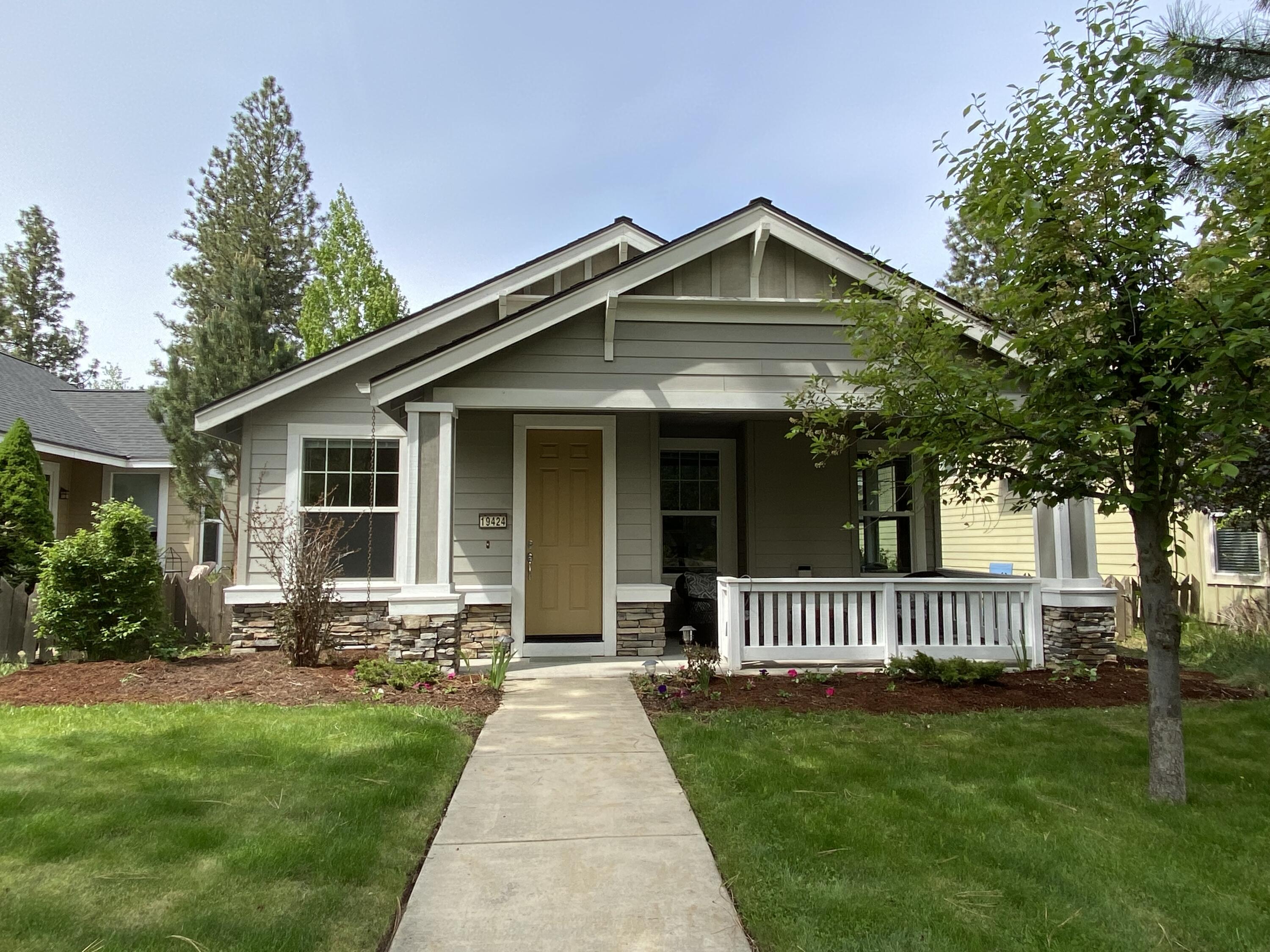 Parks at Broken Top is one of Bend's premier communities.  Located on the west side, it features a pool, sports court, lovely parks with picnic areas---along with easy access to walking trails, restaurants, OSU Cascade campus, and the Old Mill. This home's one level open floor plan includes a vaulted living/dining/kitchen great room and high ceilings throughout the house for a lofty, airy feel. Well-placed large windows and skylights provide lots of natural light.  The primary bedroom suite has a walk-in closet, bathroom with tiled shower and double sinks.  The den/office can easily be converted to a third bedroom.  Attached 2-car garage is located off the laundry room at rear of home and has lots of storage plus space for 2 cars in the driveway.  There is a large, covered porch and big side patio.  New roof '22; frig, water heater '23; furnace, AC, stove, dishwasher, microwave '20,  Excellent floorplan and use of space.  You will   appreciate the picturesque beauty of this community.